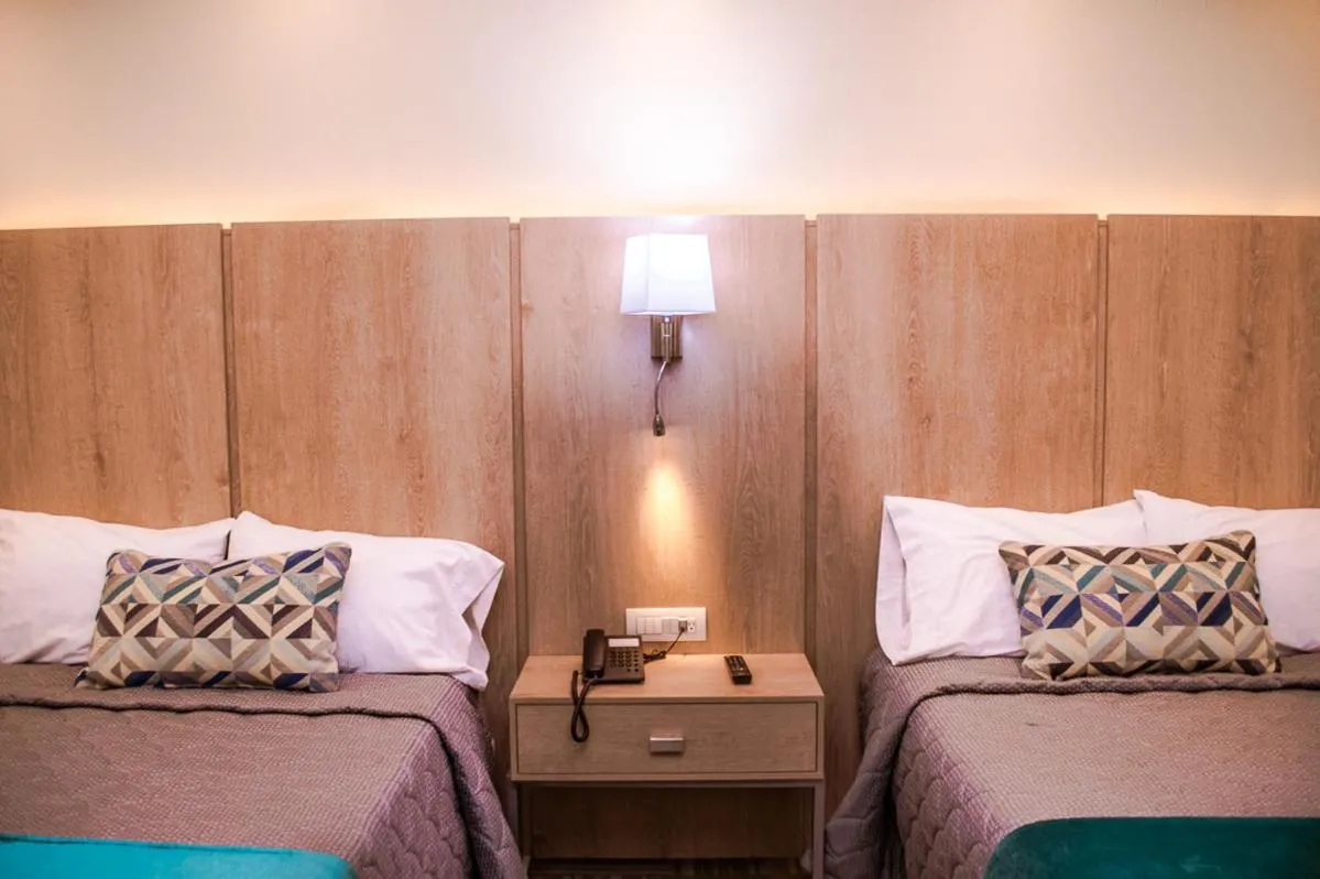 Bed in La Siesta Hotel