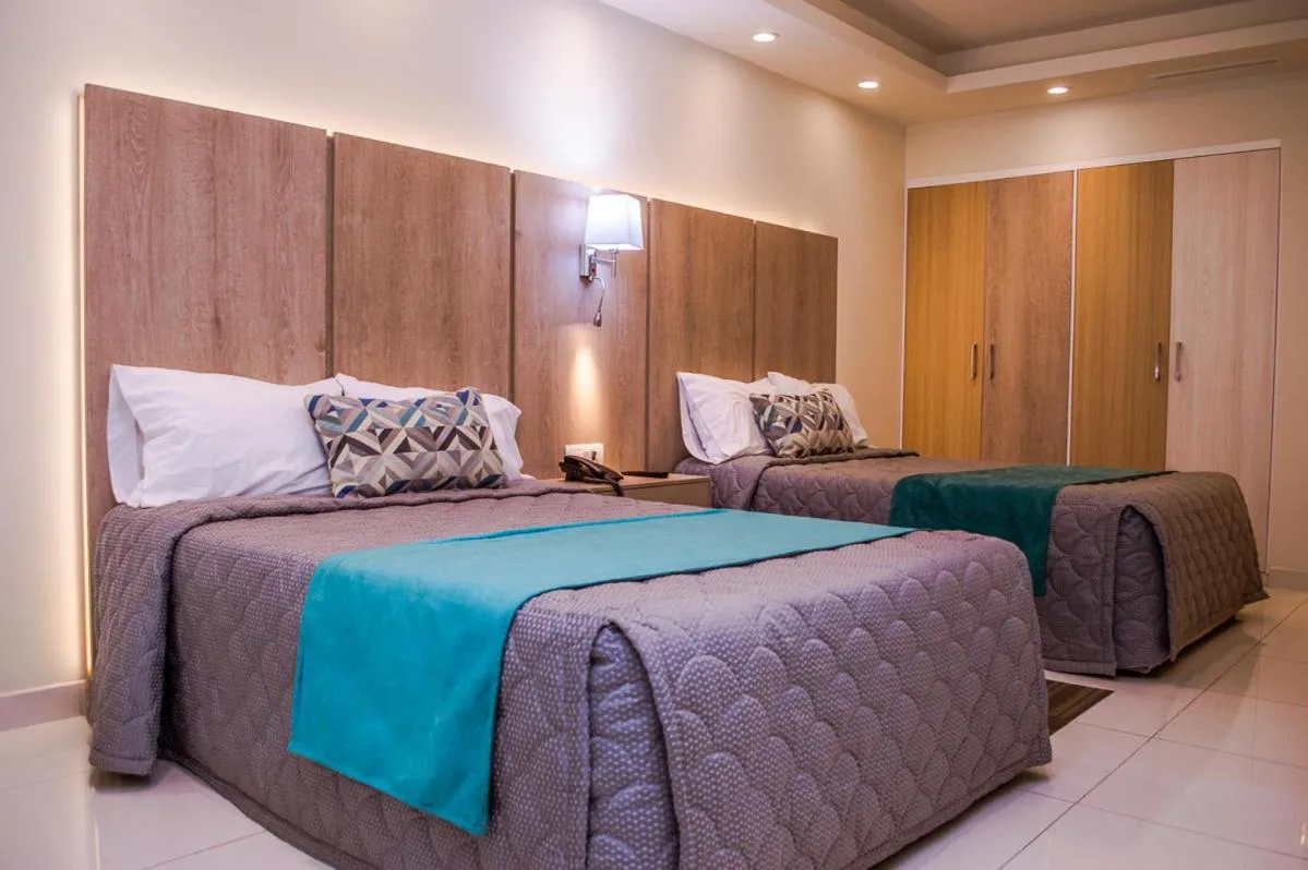 Bed in La Siesta Hotel