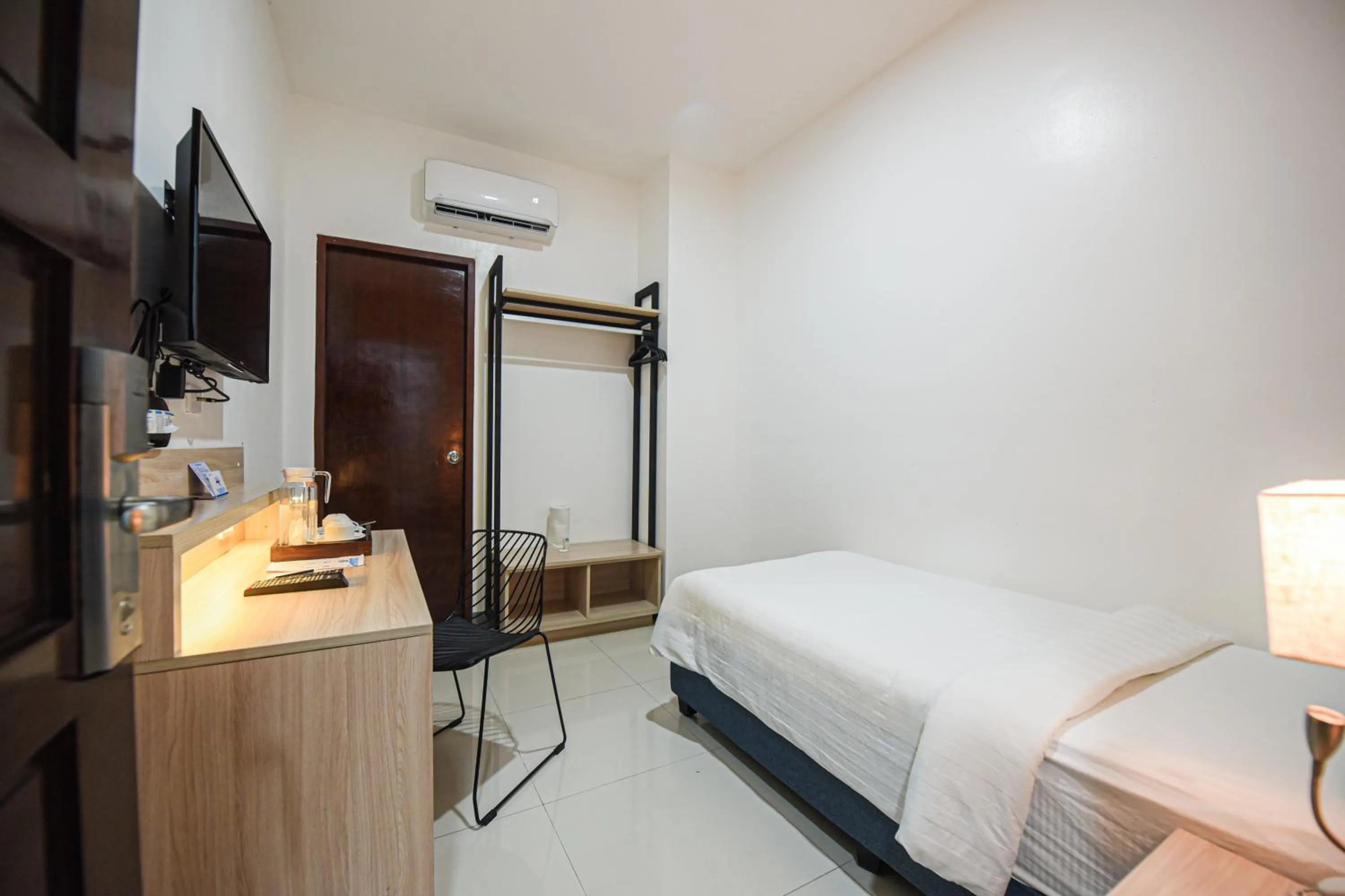 Bedroom in Figtree Hotel