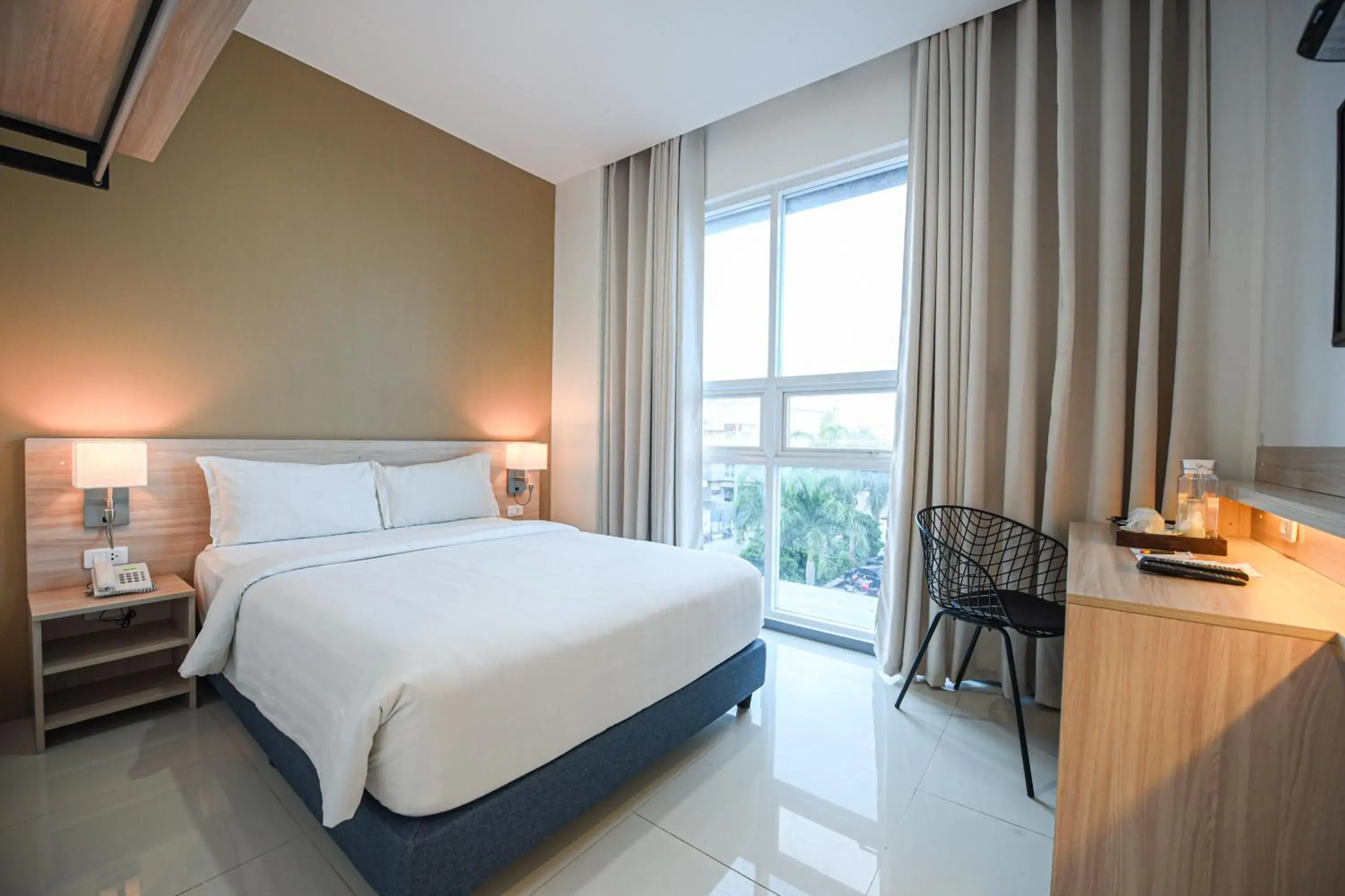 Bedroom in Figtree Hotel Bedroom in Figtree Hotel