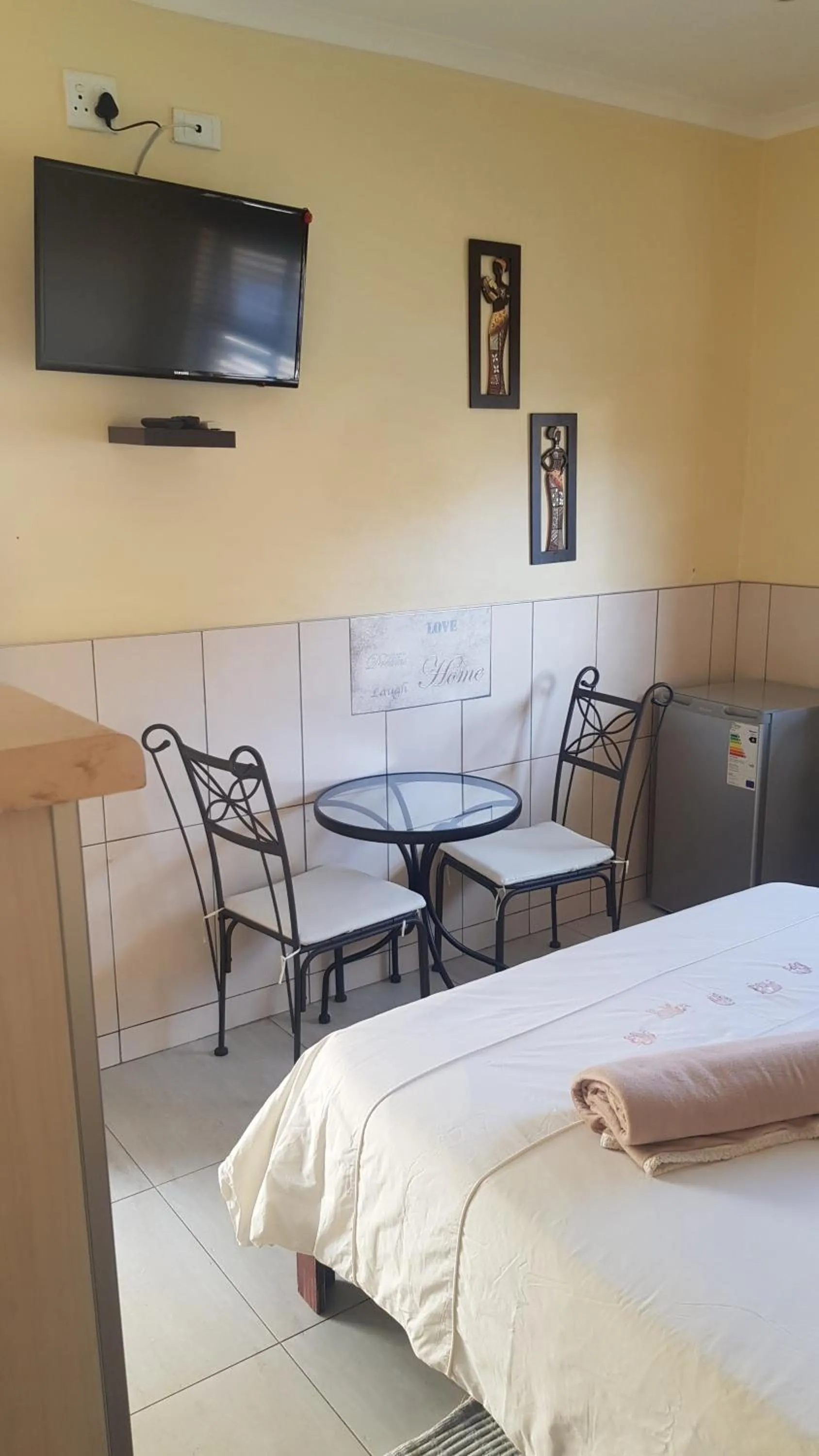 Seating area, Bed in Esperanca Guesthouse
