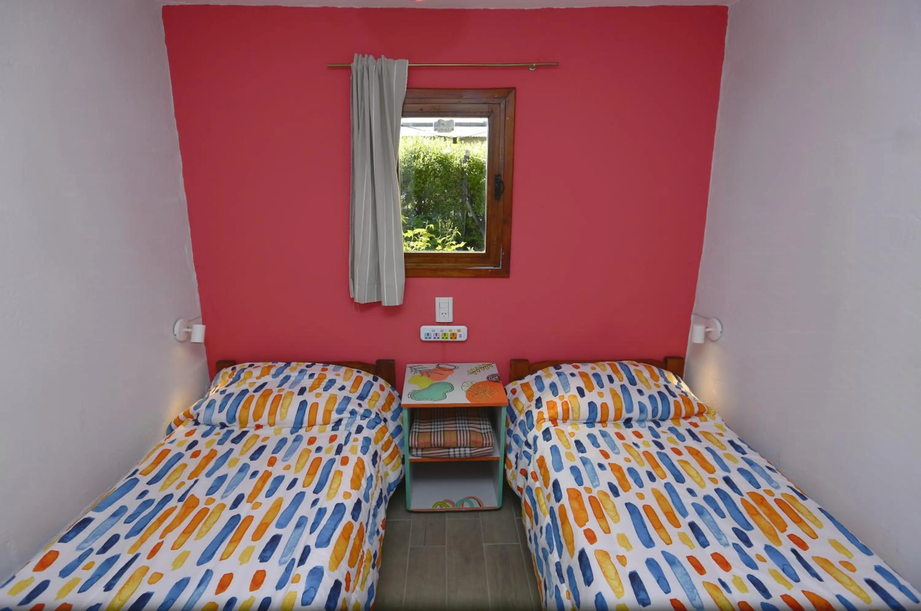 Small Double Room with Shared Bathroom - single occupancy in Lago Argentino Hostel