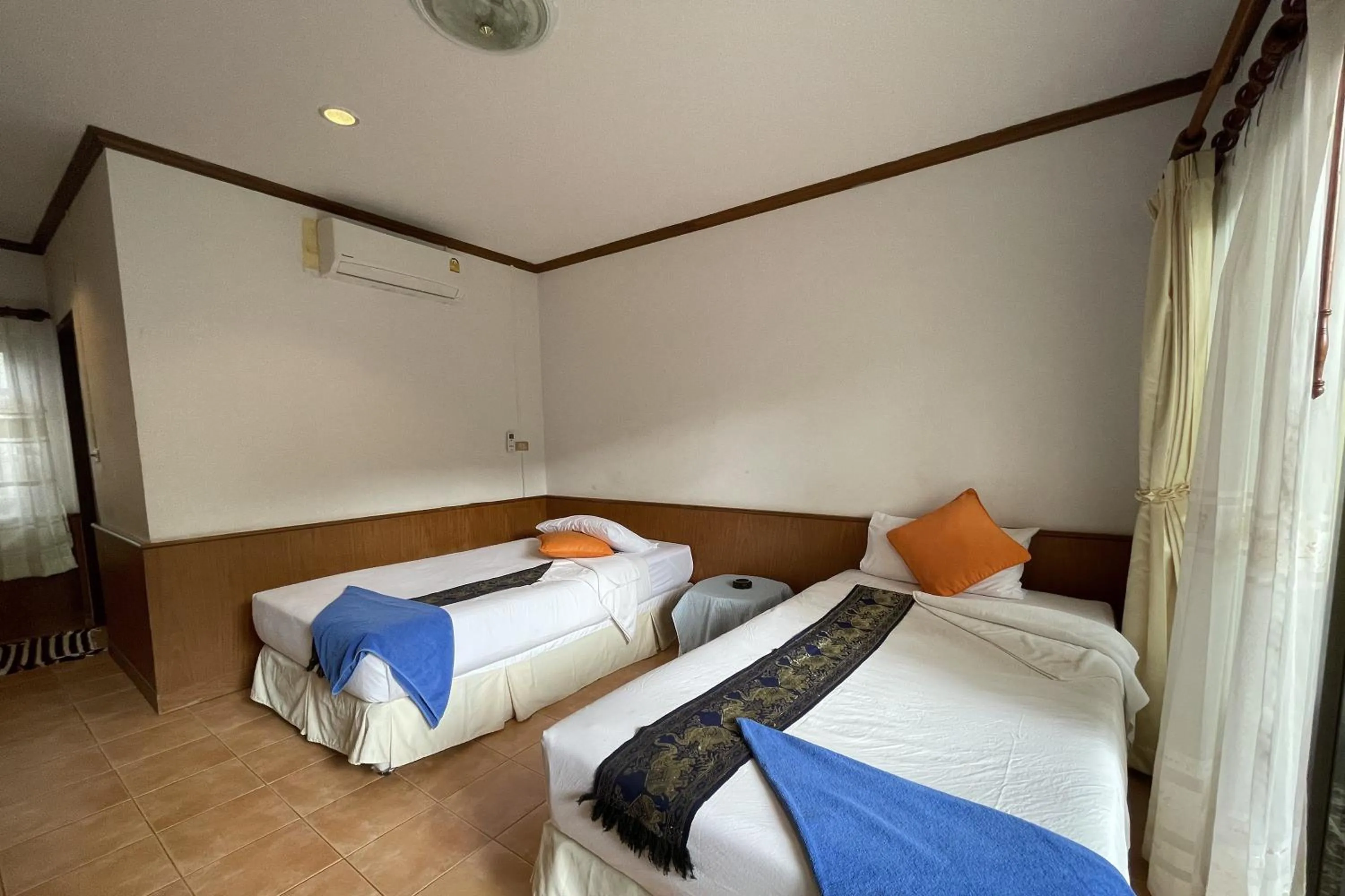 Bed in Sea Breeze Bungalow