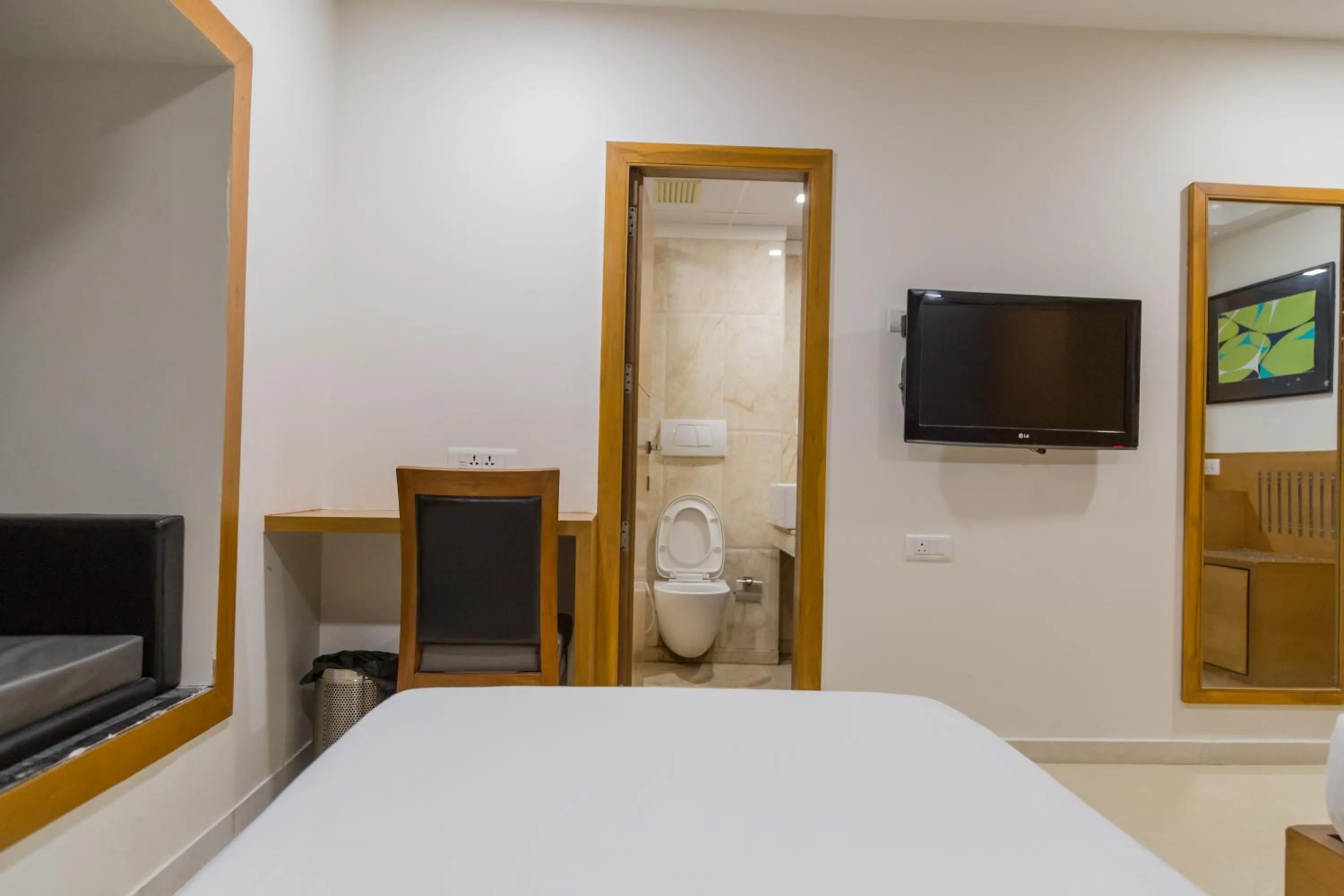 Bathroom, Bed in Ginger Ahmedabad, Satellite