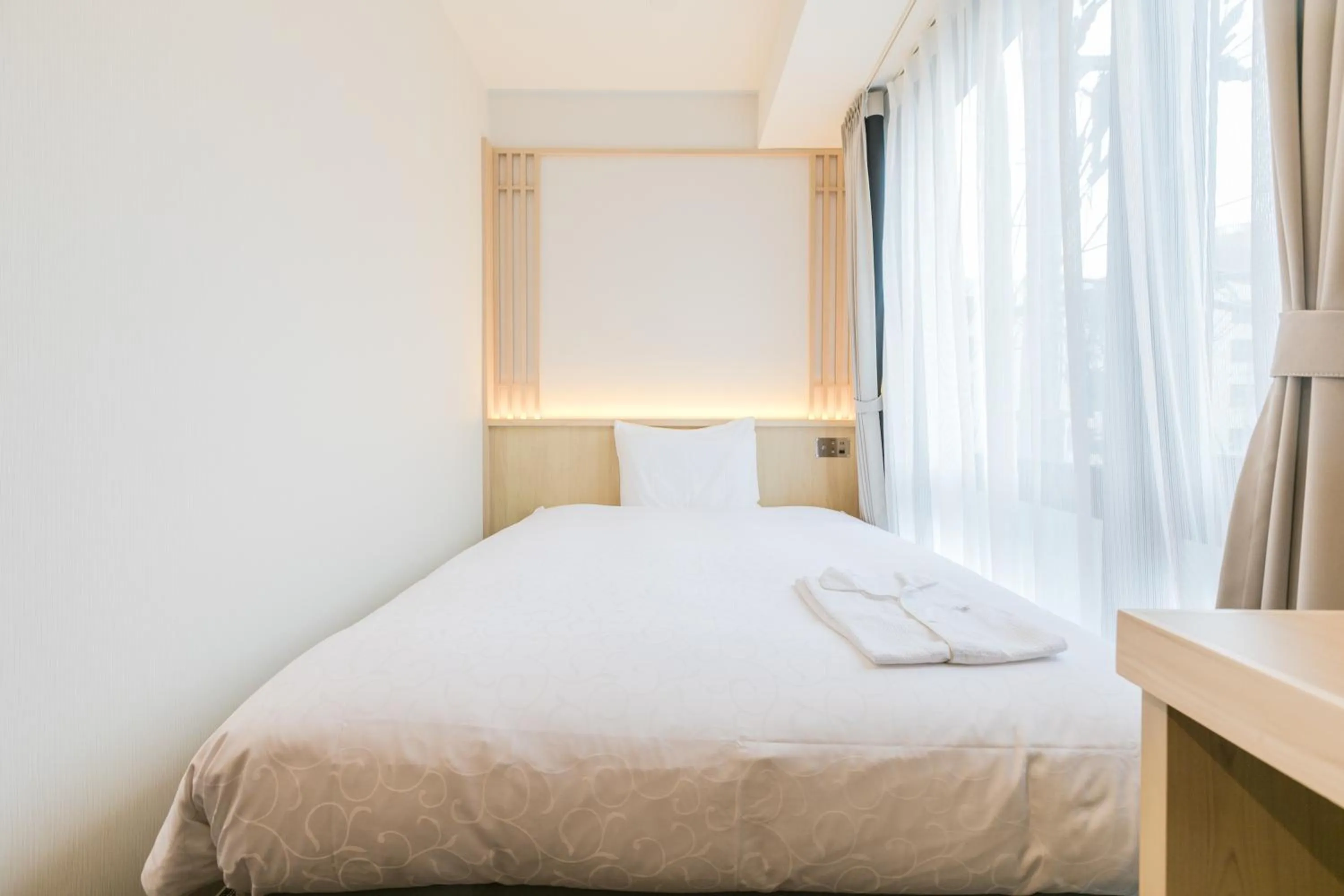 Bed in Henn na Hotel Kyoto Hachijoguchi