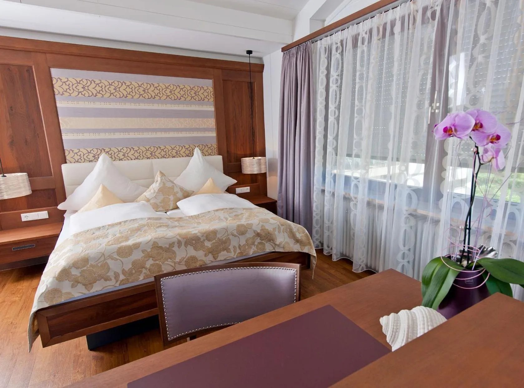 Photo of the whole room, Bed in Hotel Heinzler am See