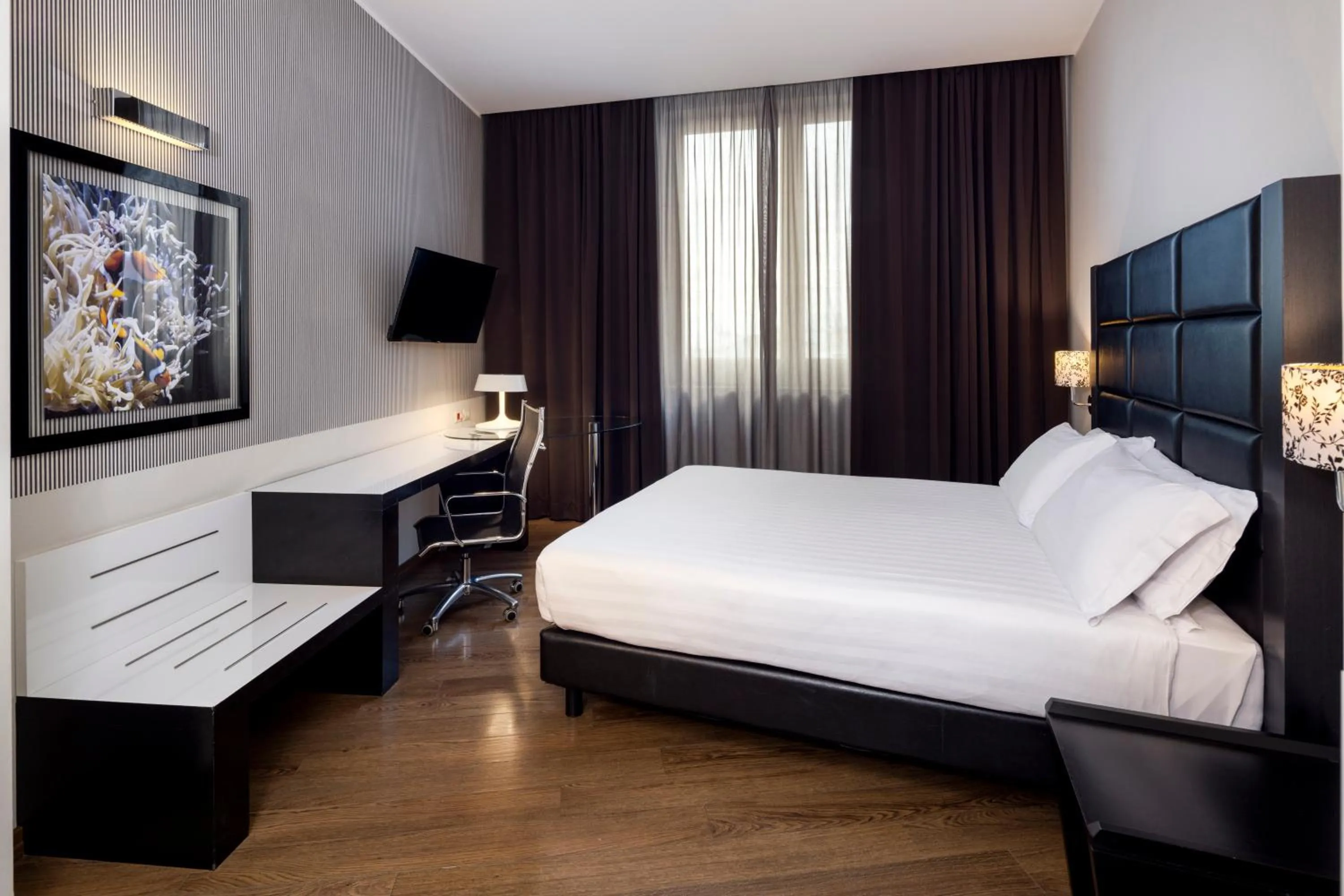 Bedroom, Bed in Holiday Inn Genoa City by IHG