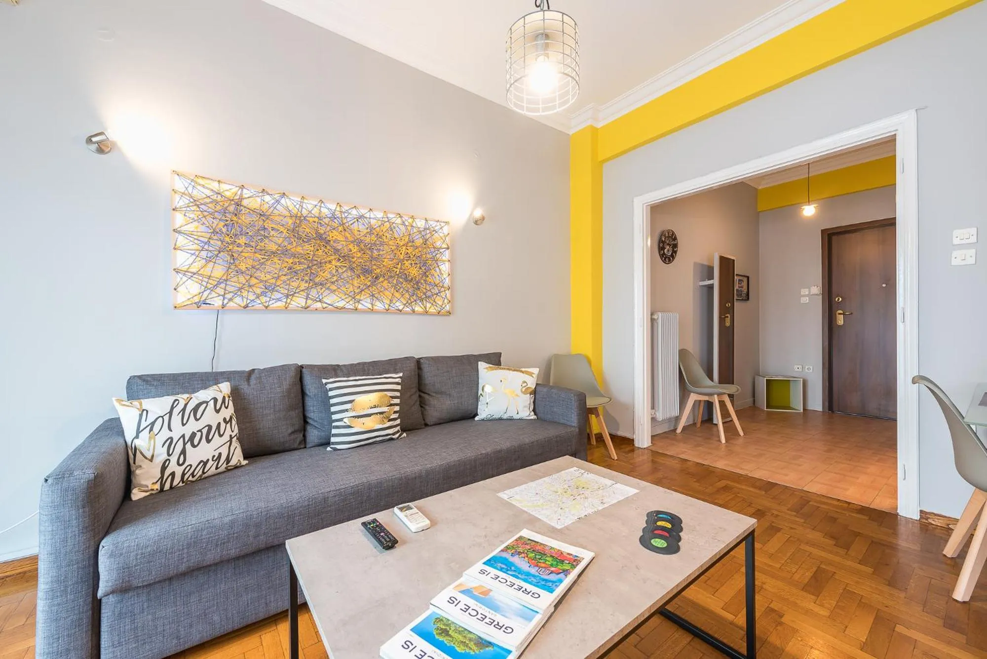 Living room in Athens Boutique Apartment by Cloudkeys