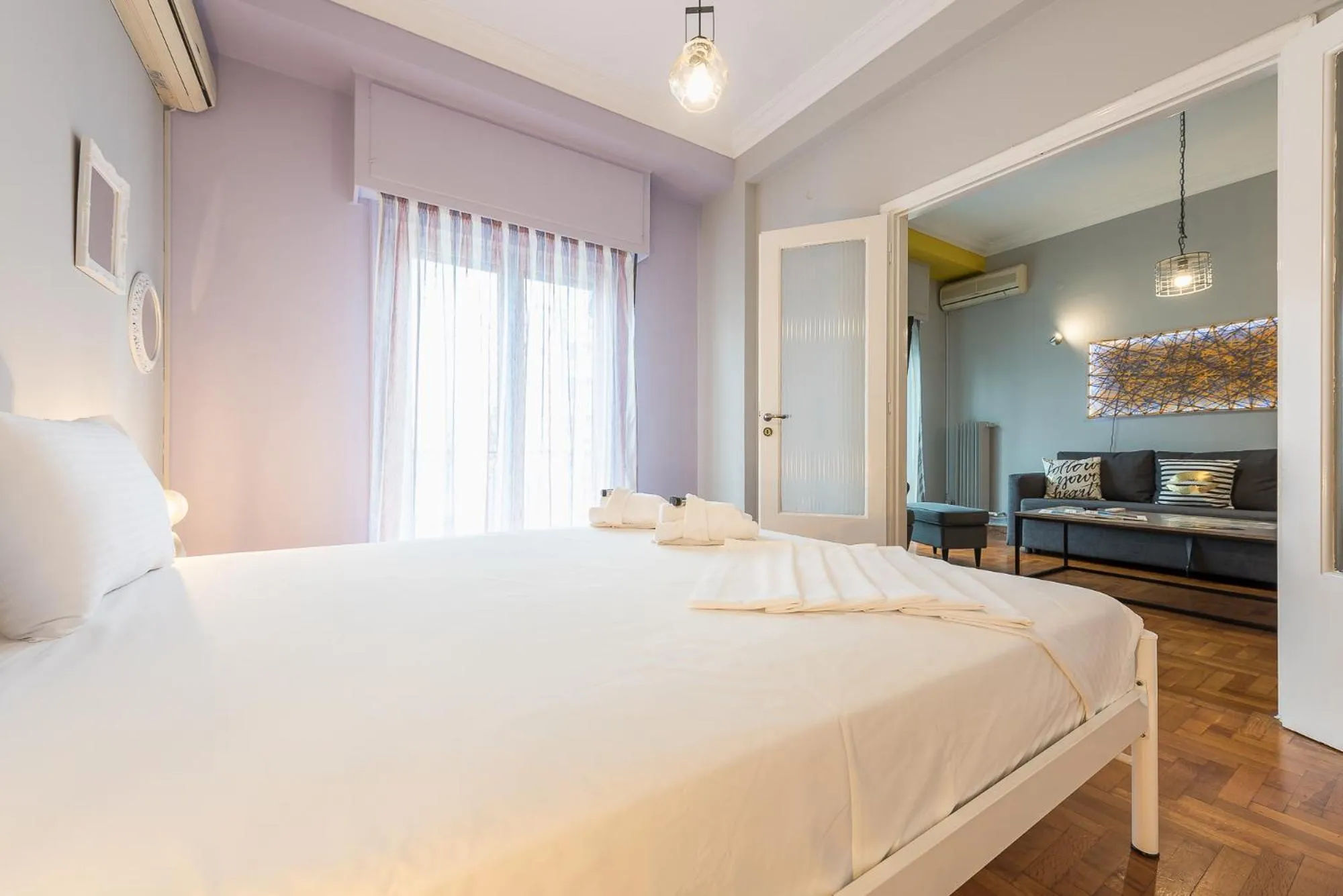 Bed in Athens Boutique Apartment by Cloudkeys