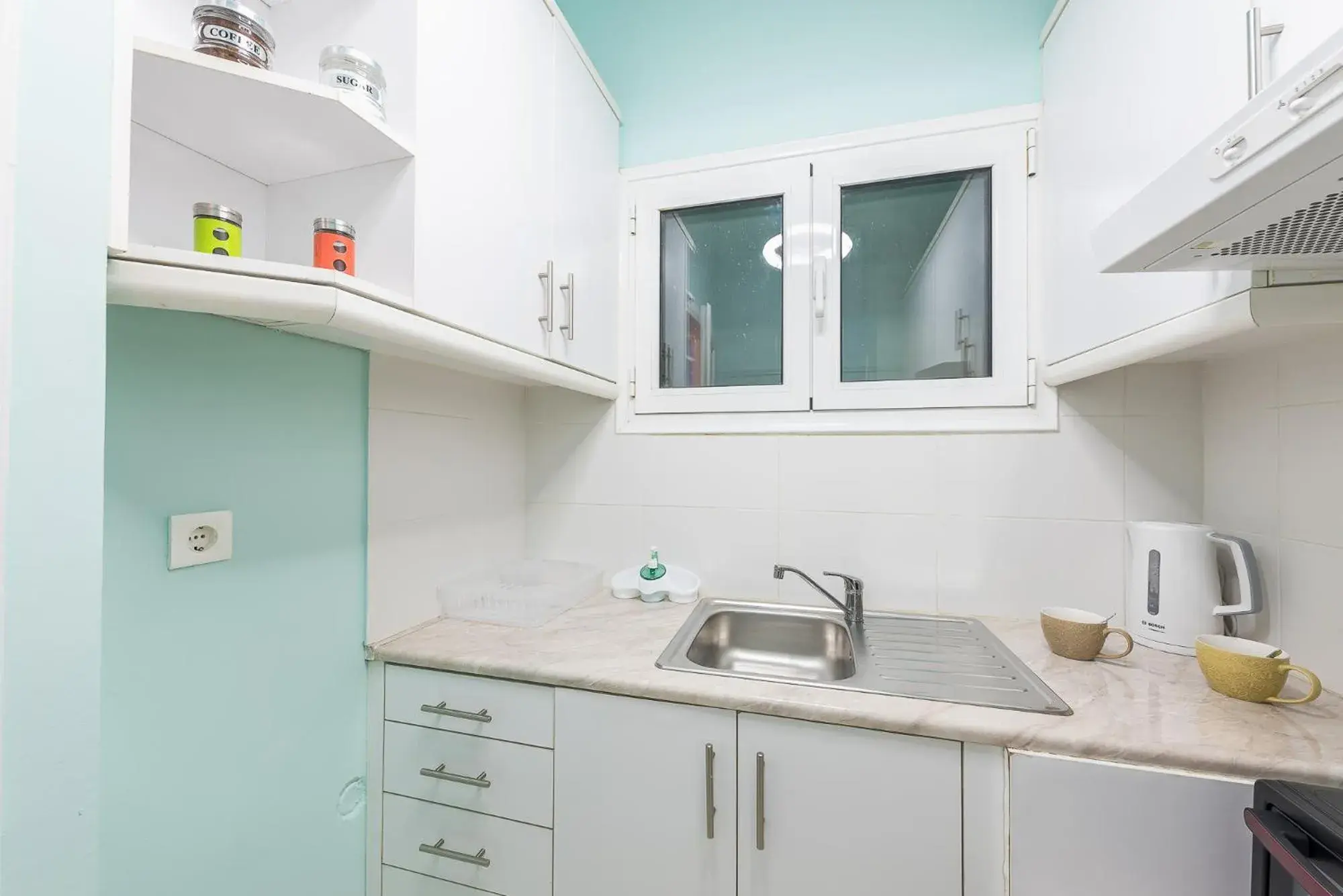 Kitchen or kitchenette in Athens Boutique Apartment by Cloudkeys Kitchen or kitchenette in Athens Boutique Apartment by Cloudkeys