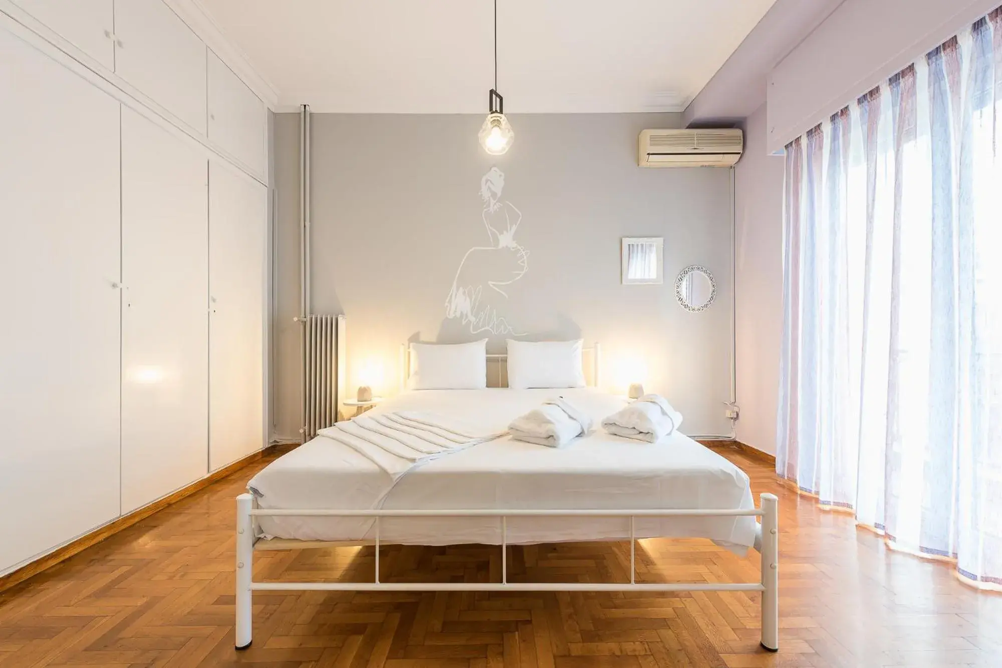 Bed in Athens Boutique Apartment by Cloudkeys Bed in Athens Boutique Apartment by Cloudkeys