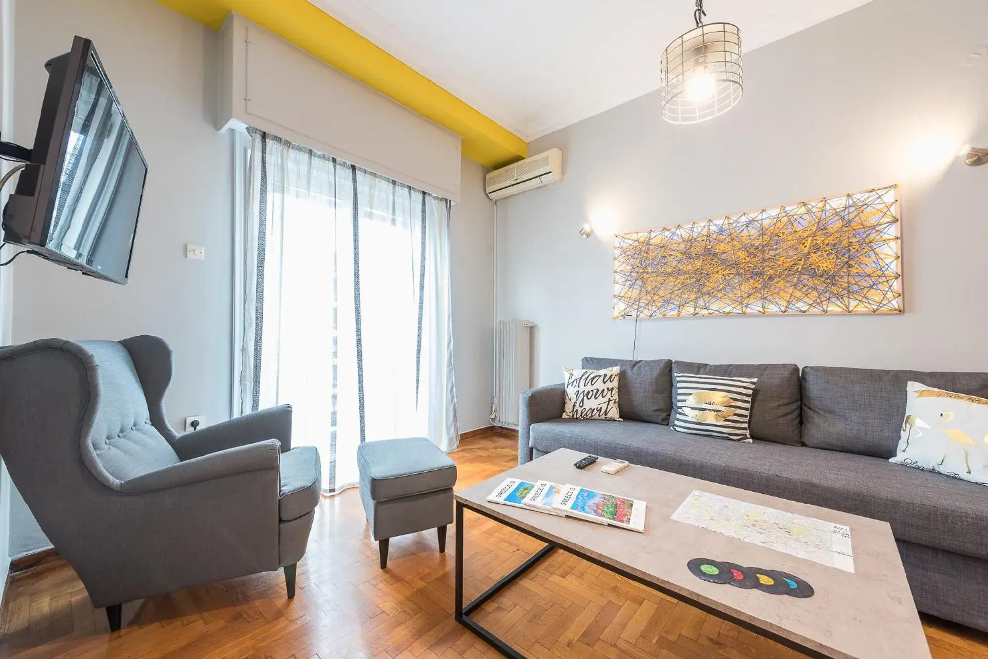 Living room in Athens Boutique Apartment by Cloudkeys Living room in Athens Boutique Apartment by Cloudkeys