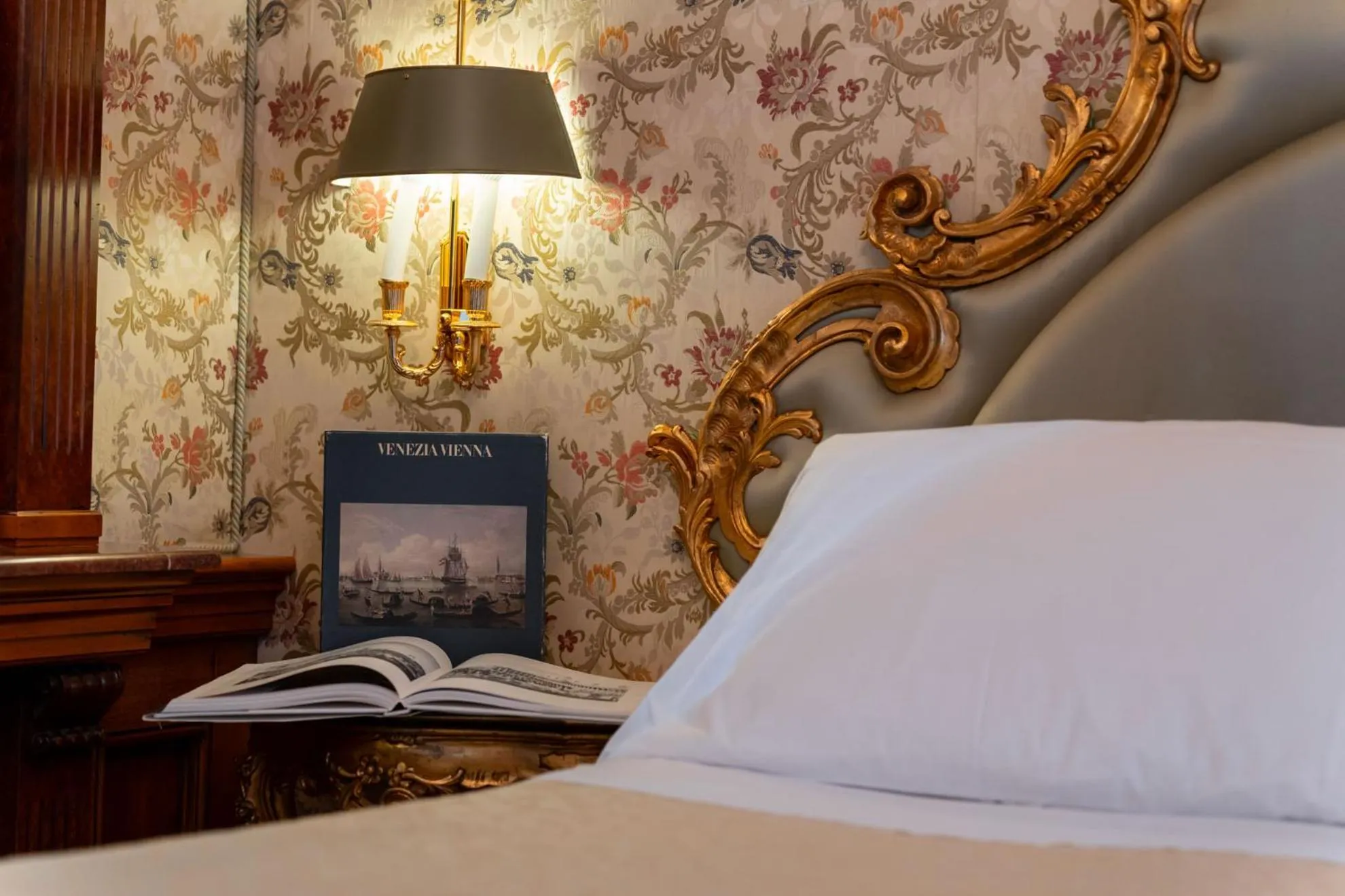 Decorative detail, Bed in Bellevue Luxury Rooms - San Marco Luxury