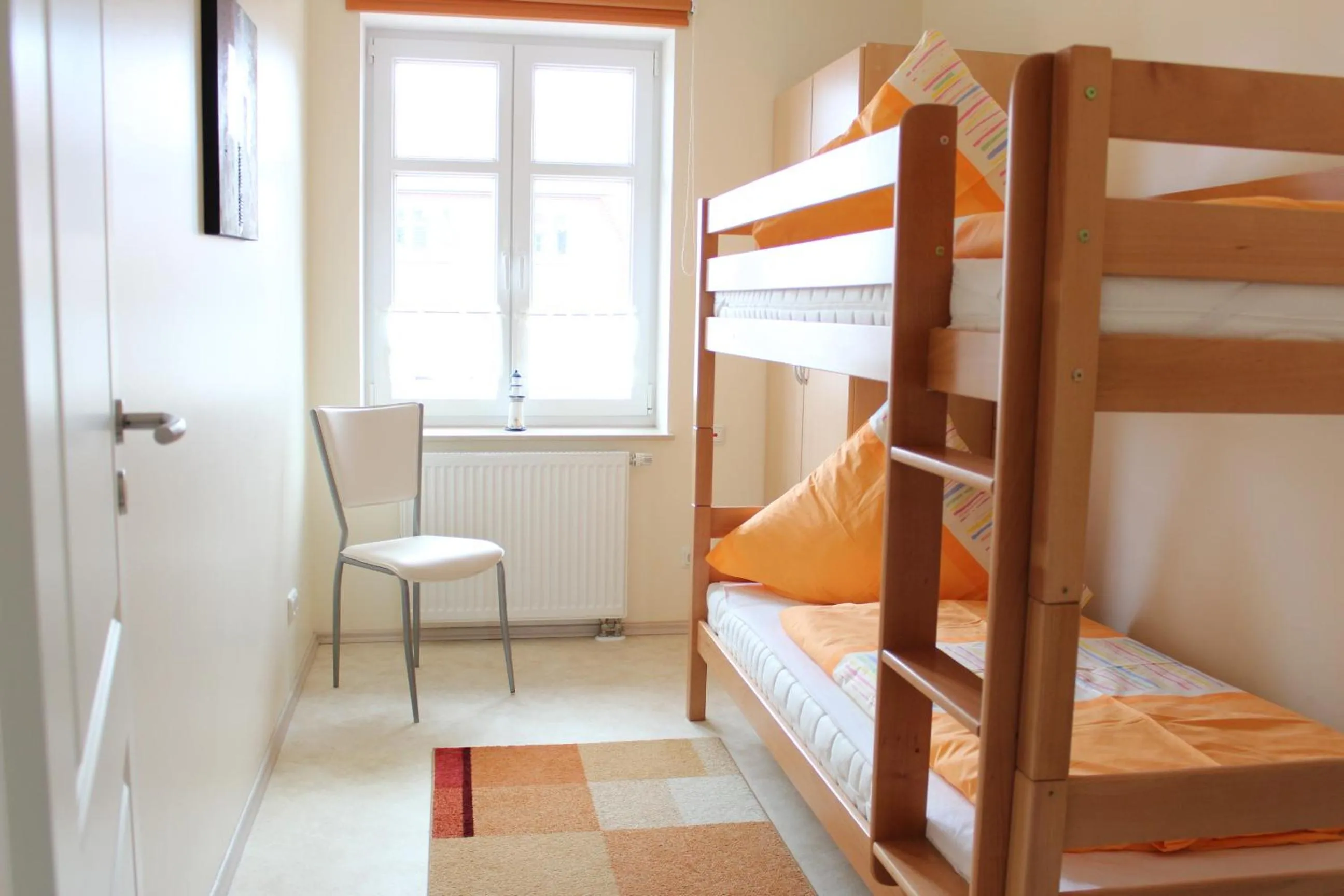 Bed in Ferienwohnungen am Museumshof