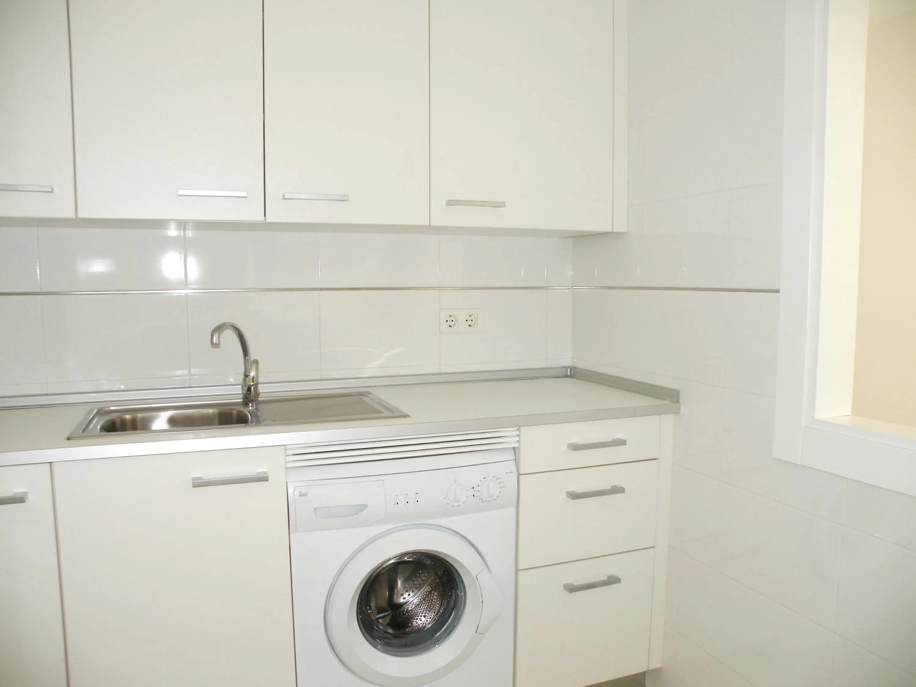 Kitchen or kitchenette in Apartamentos Doña Carmen