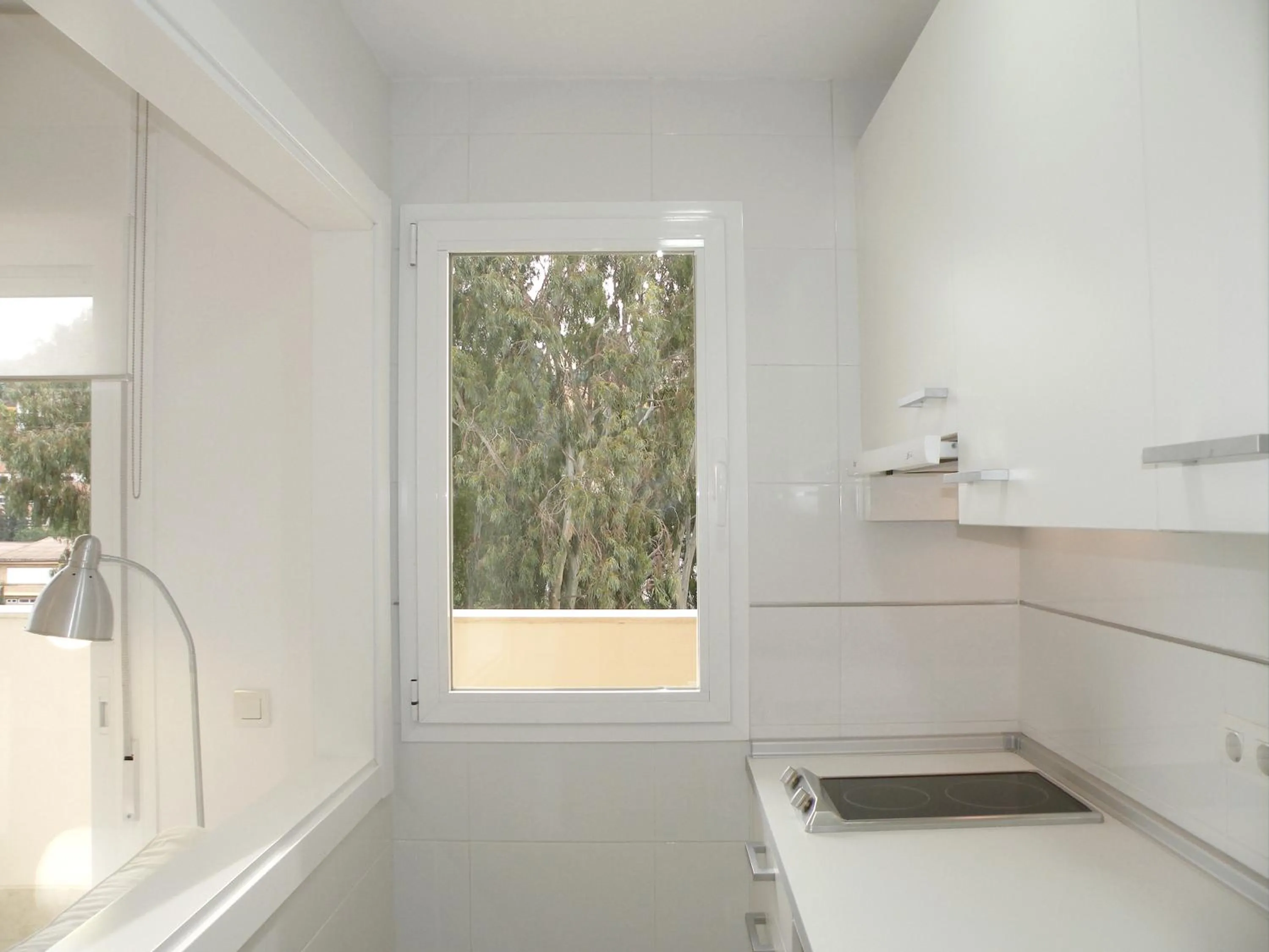 Kitchen or kitchenette in Apartamentos Doña Carmen