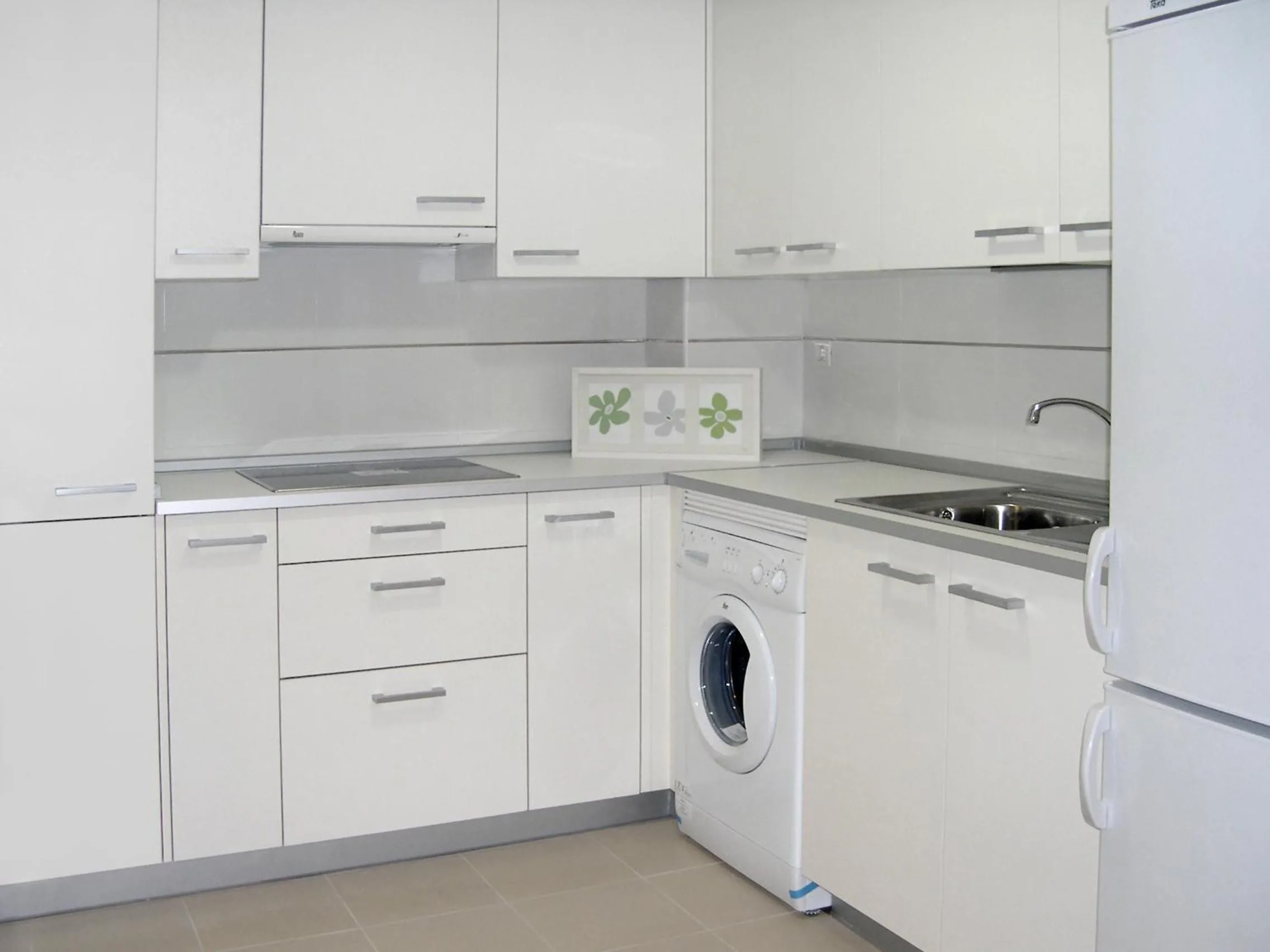 Kitchen or kitchenette in Apartamentos Doña Carmen