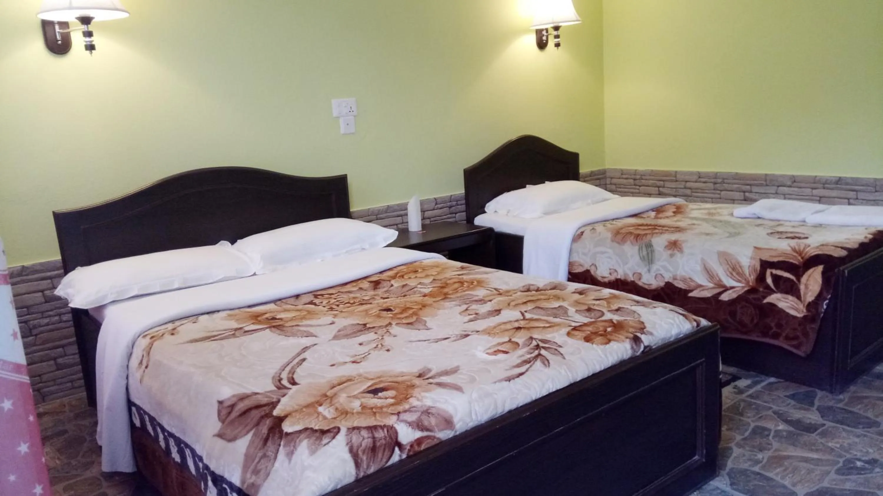 Bed in New Pokhara Lodge - Pokhara Lakeside