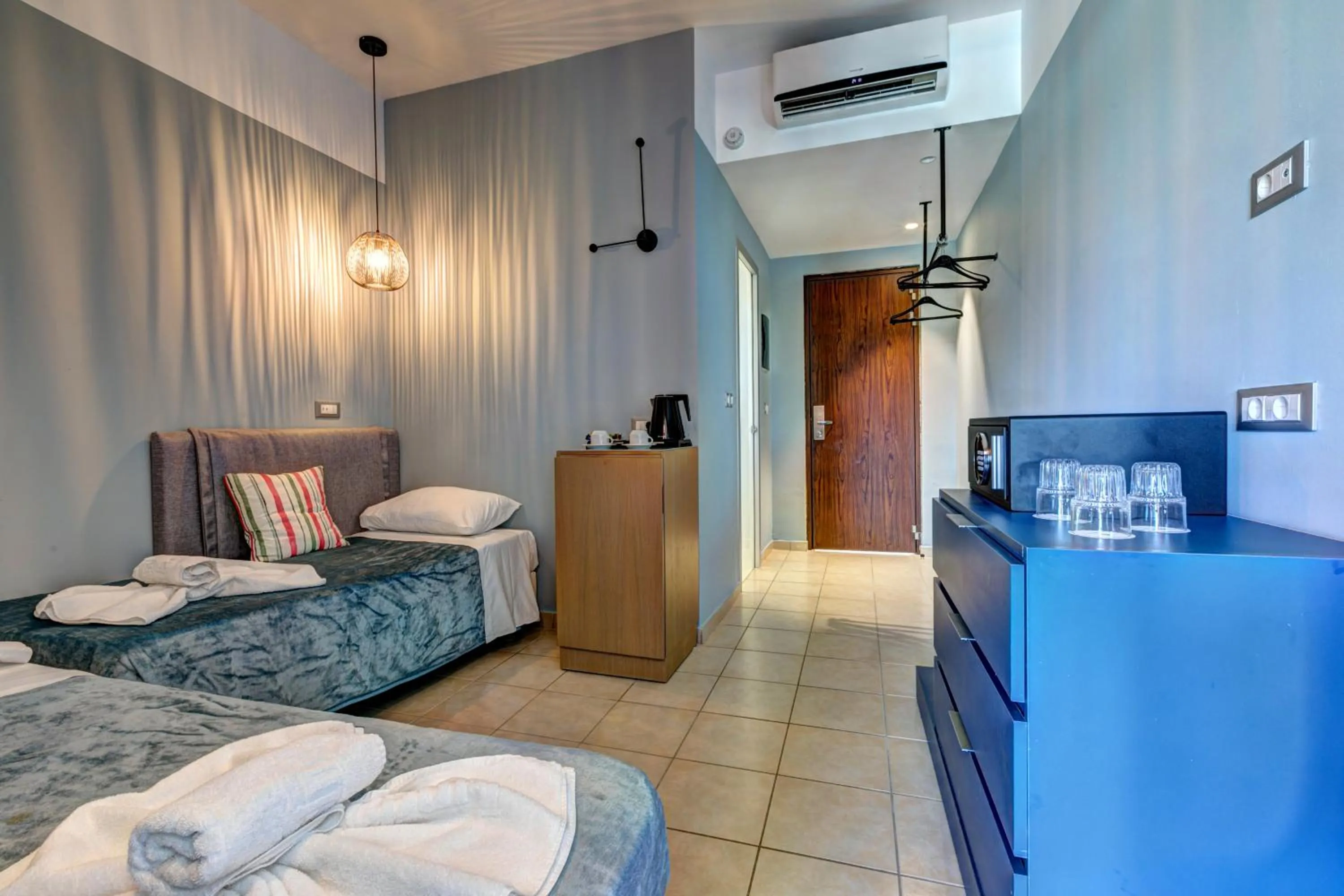 Bed in Lindos Breeze Beach Hotel