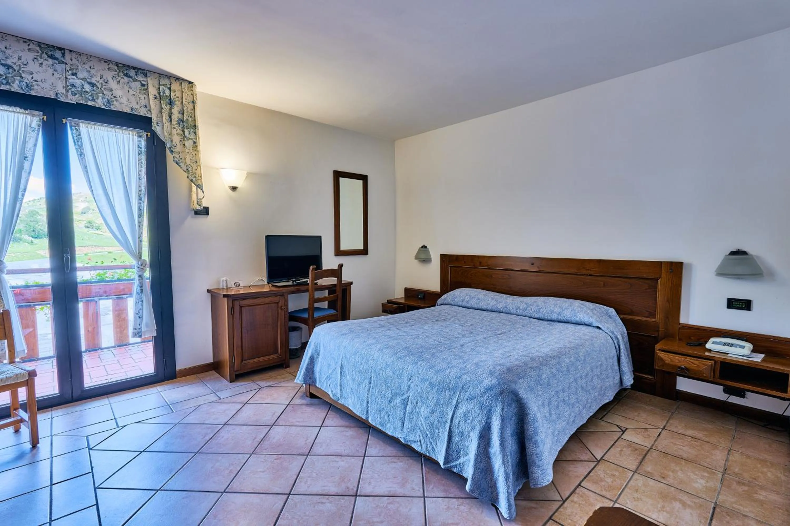 Bed in Hotel Pizzalto