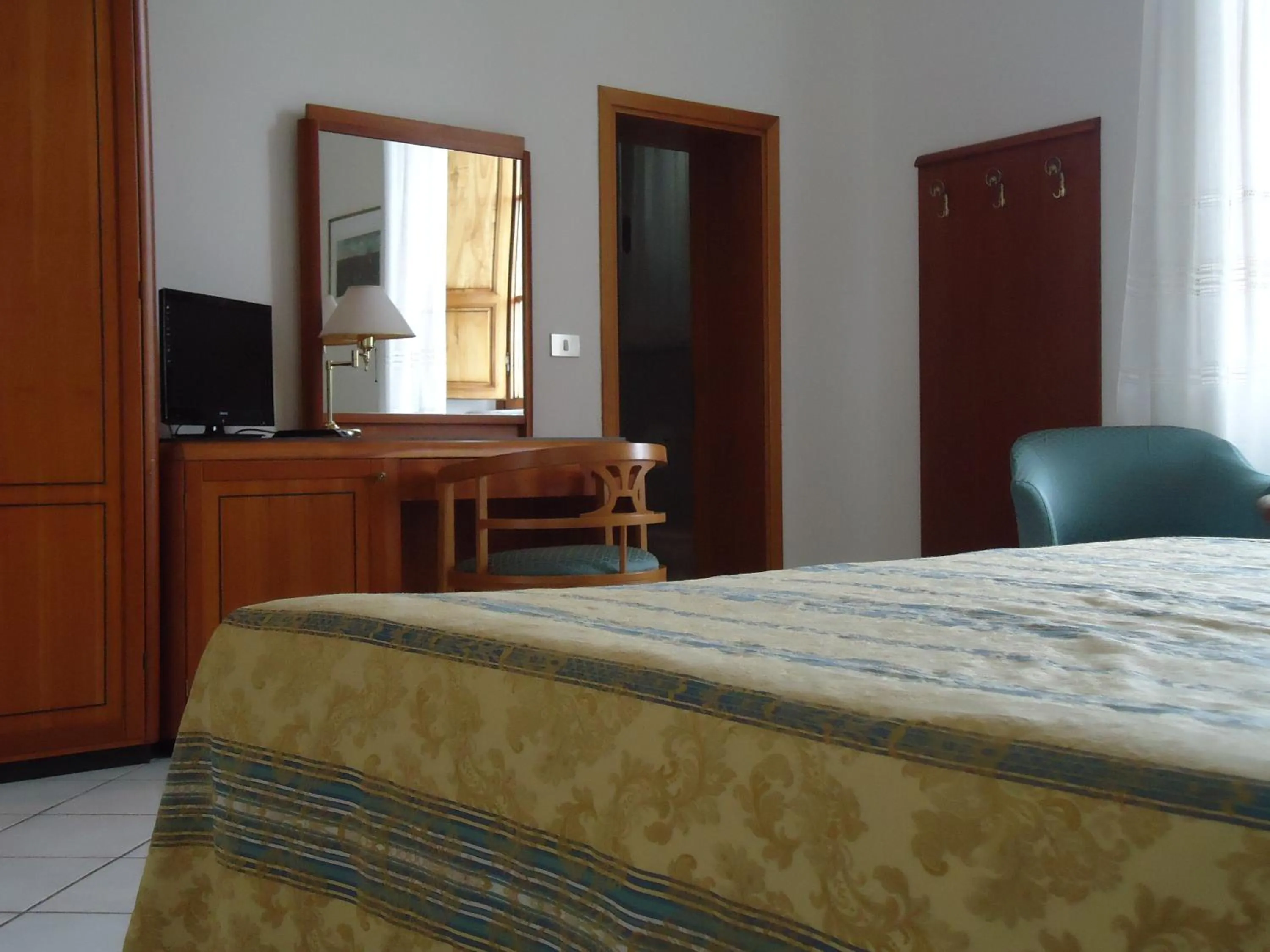 Photo of the whole room, Bed in Albergo Roma