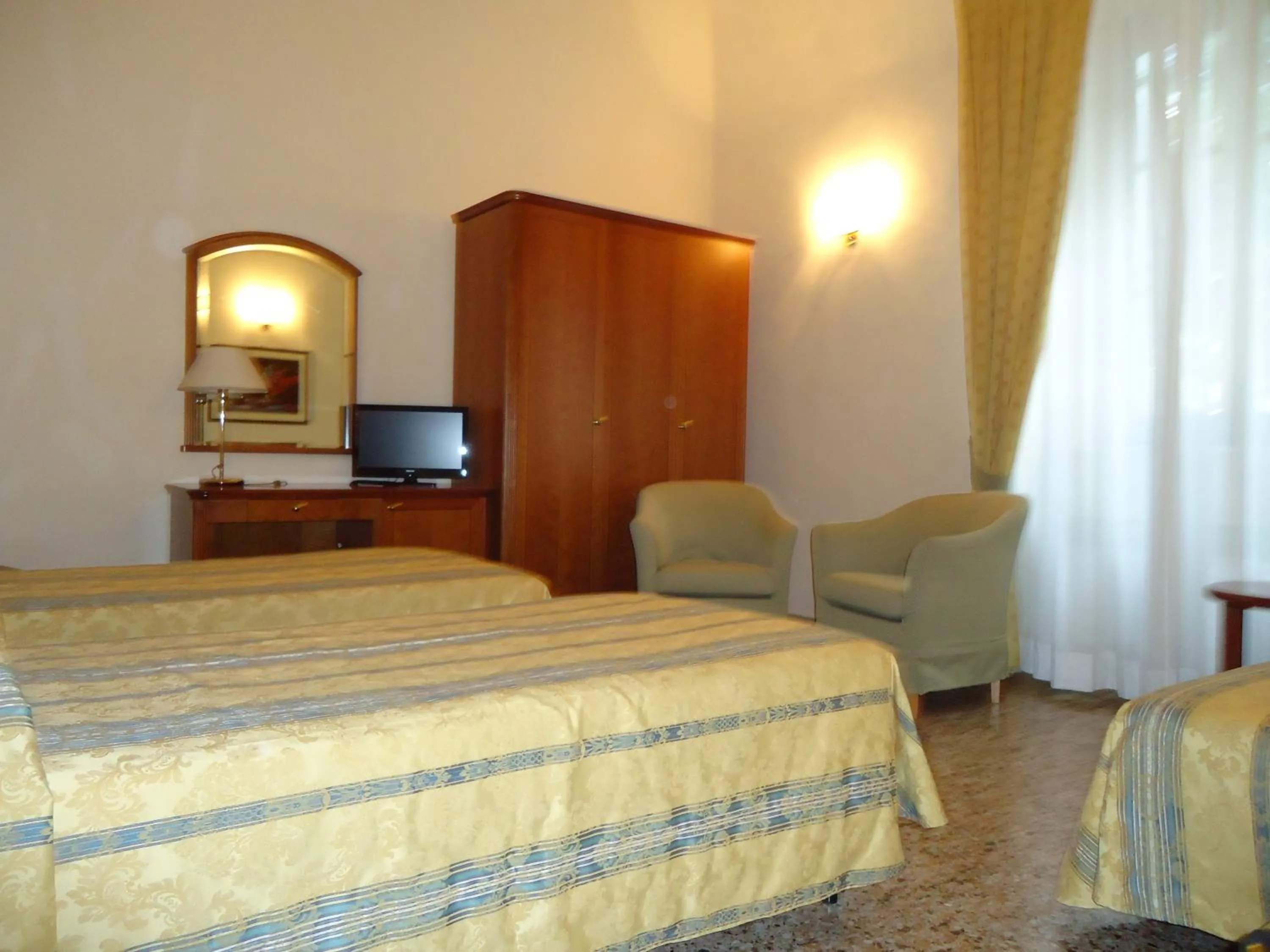 Photo of the whole room, Bed in Albergo Roma