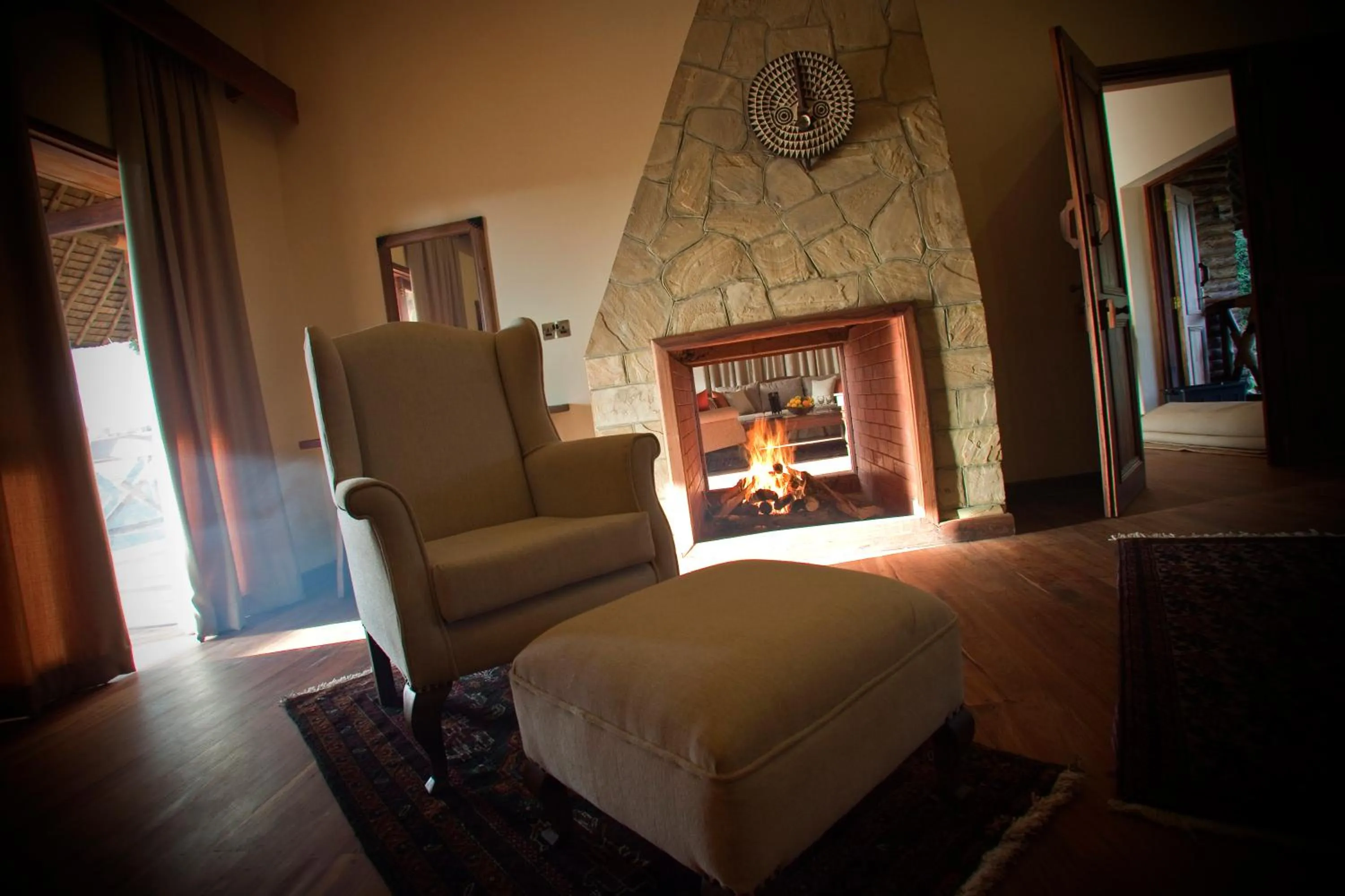 Seating area, Bed in Neptune Ngorongoro Luxury Lodge - All Inclusive