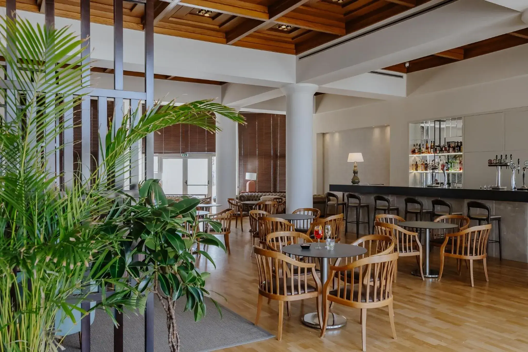 Lounge or bar in Golden Coast Beach Hotel Lounge or bar in Golden Coast Beach Hotel