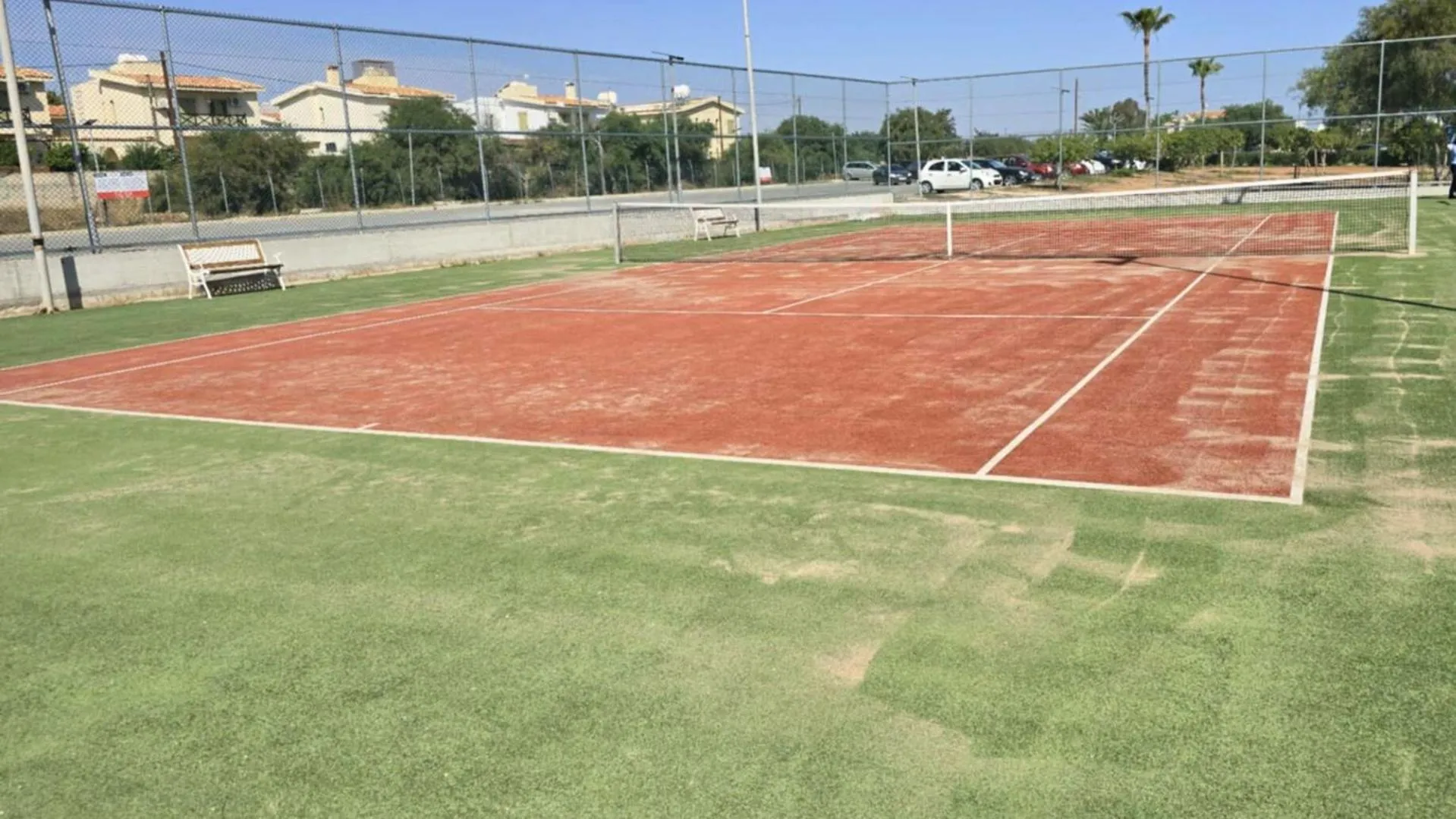 Tennis court in Golden Coast Beach Hotel