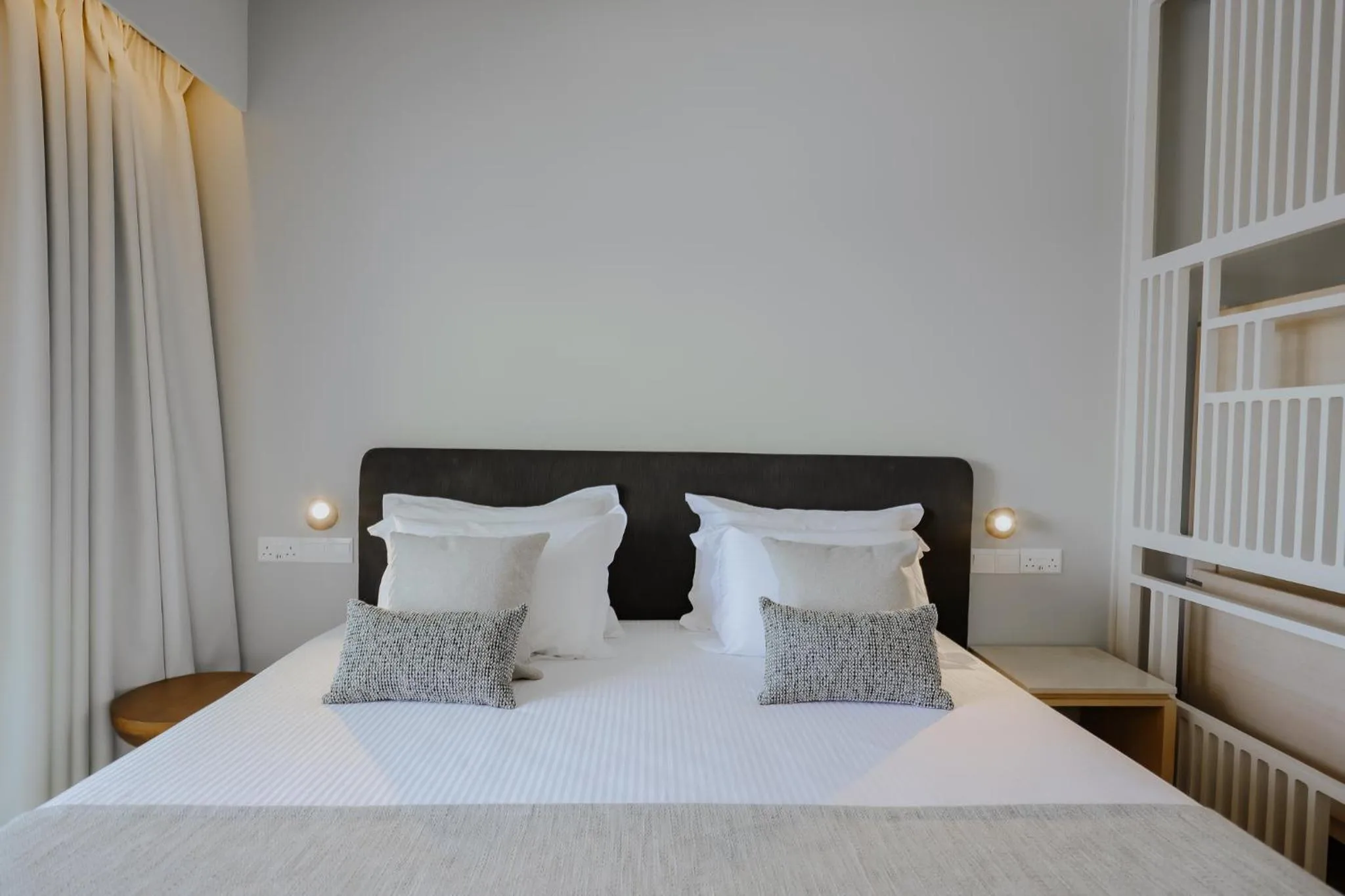 Bed in Golden Coast Beach Hotel