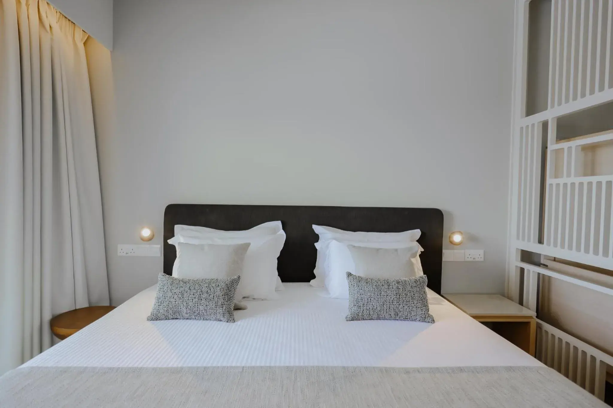 Bed in Golden Coast Beach Hotel Bed in Golden Coast Beach Hotel