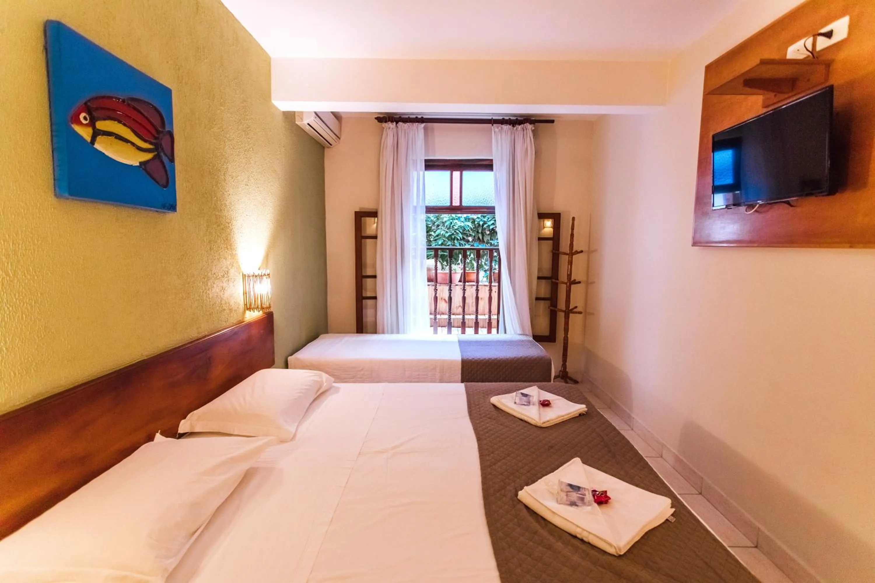 Bed in VELINN Pousada Villa Caiçara