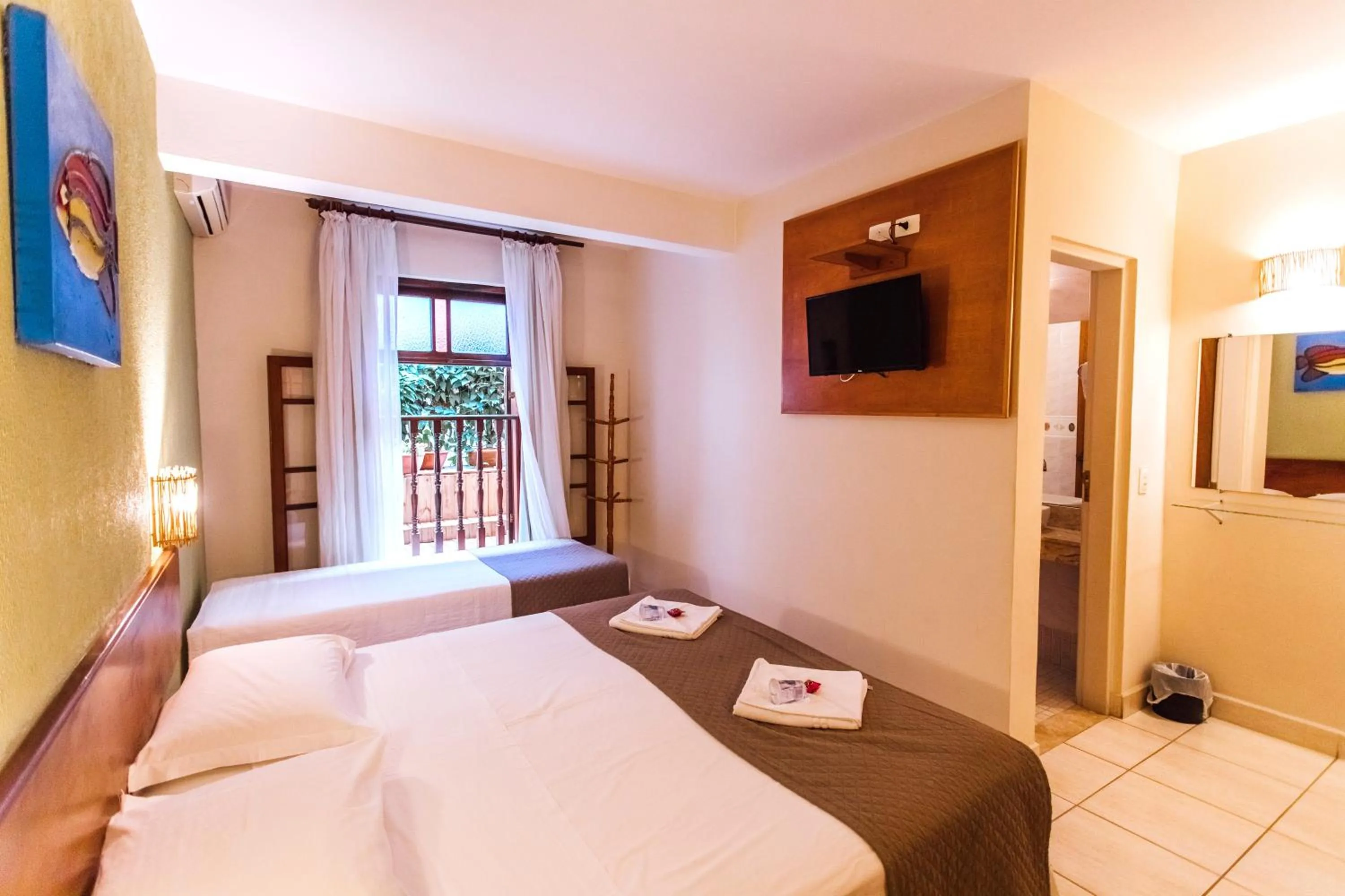 Bed in VELINN Pousada Villa Caiçara