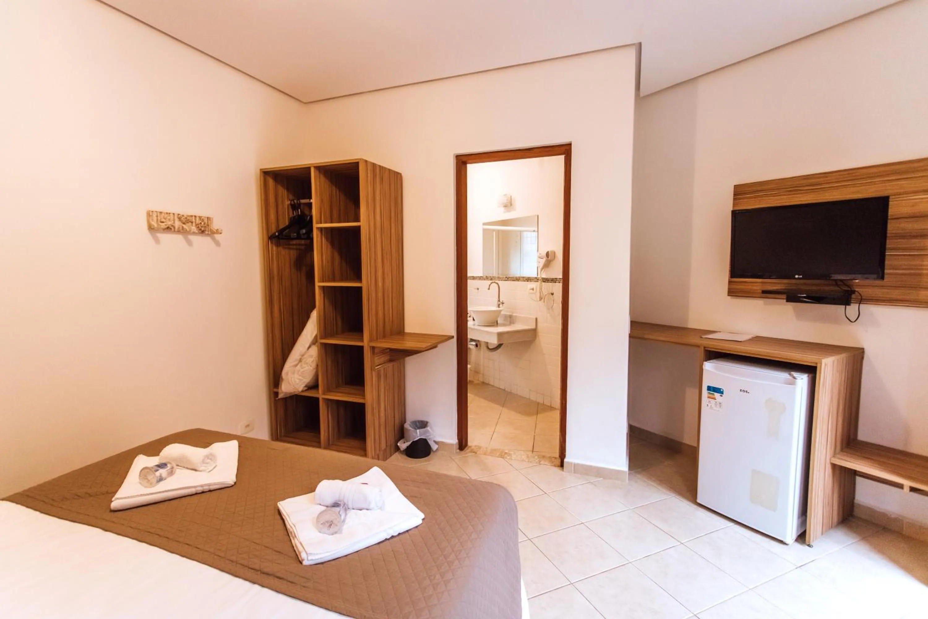 TV and multimedia, Bed in VELINN Pousada Villa Caiçara