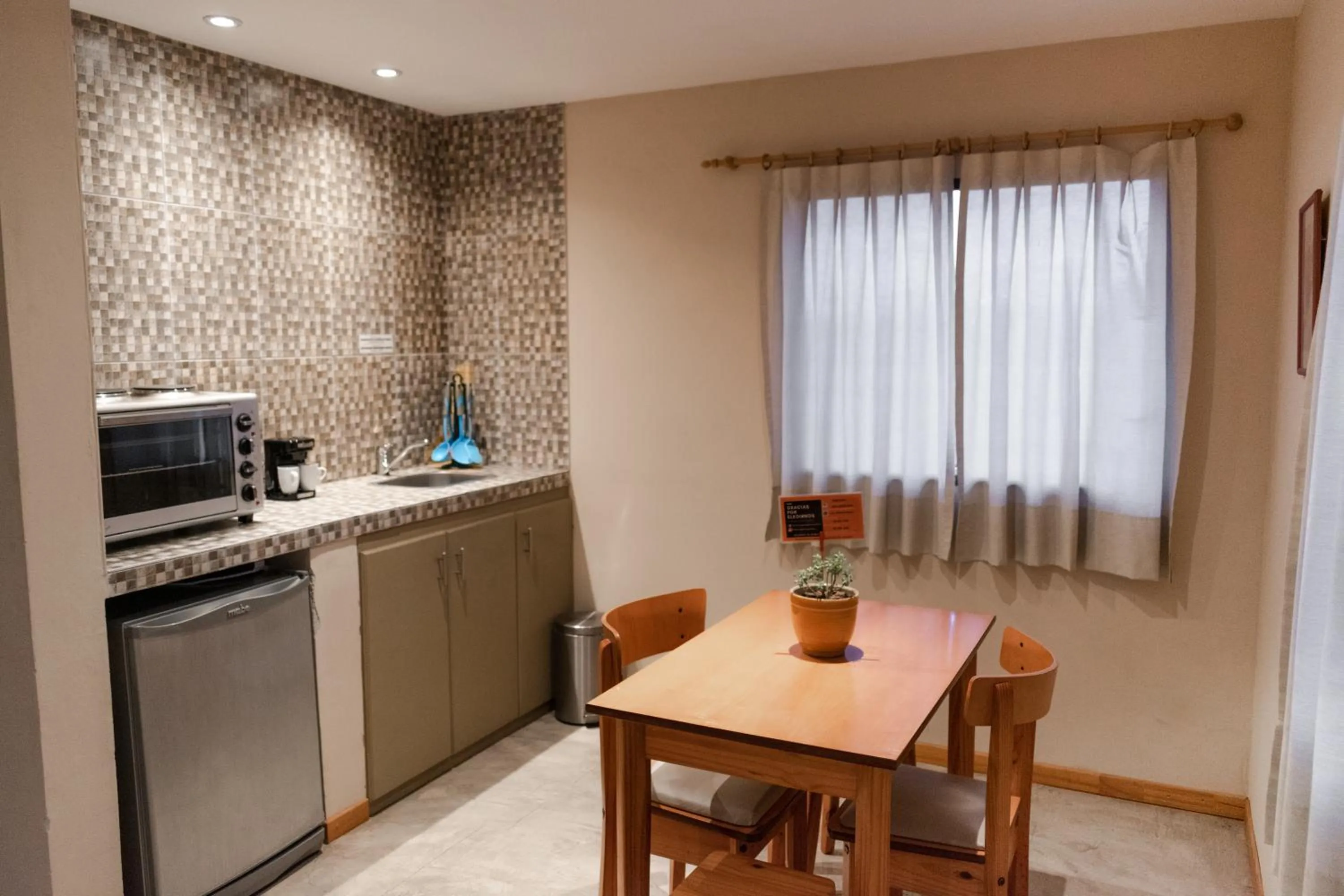 Dining area in Paraiso Patagónico Bungalows and Aparts