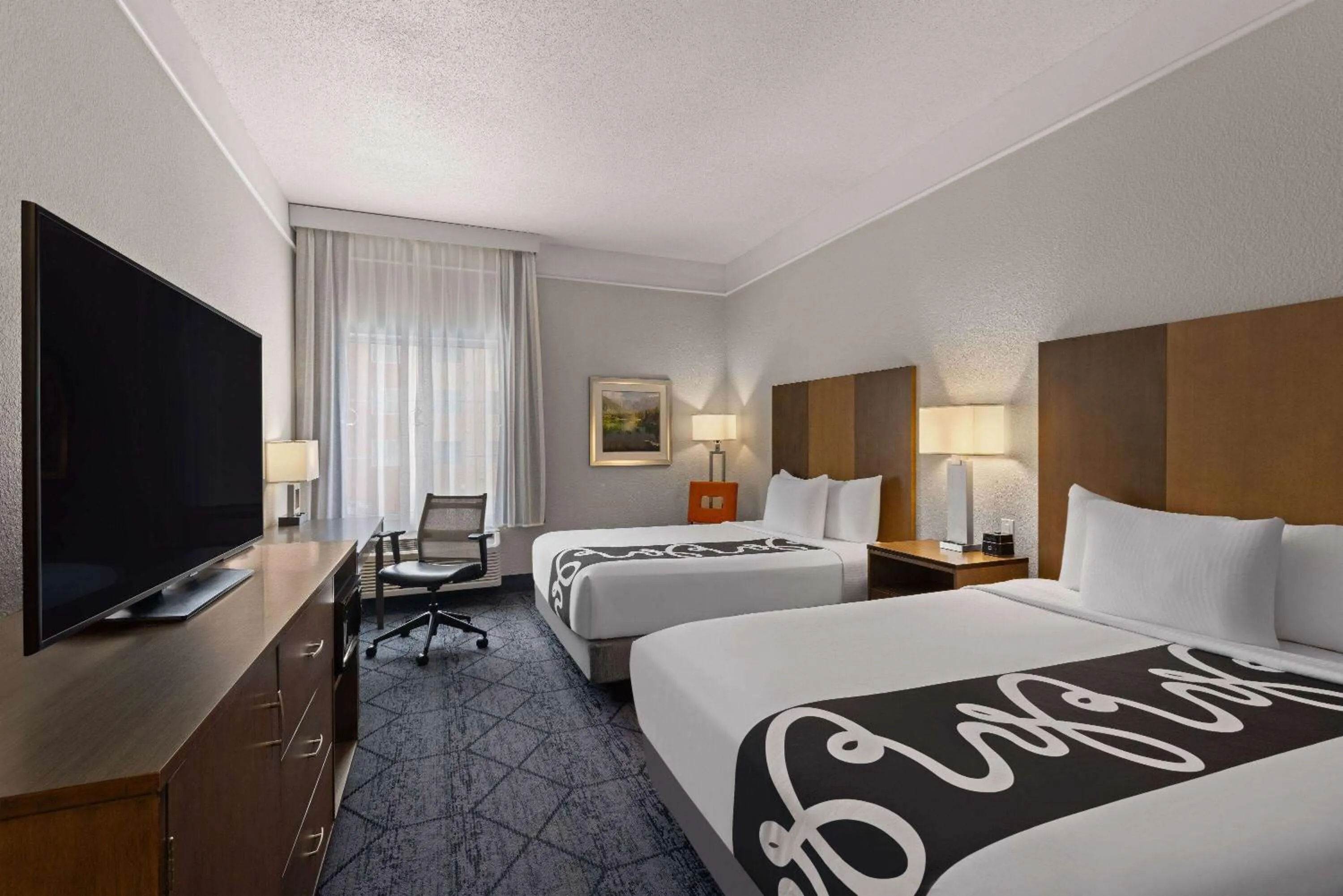 Photo of the whole room, Bed in La Quinta Inn and Suites by Wyndham at WaTiki Waterpark