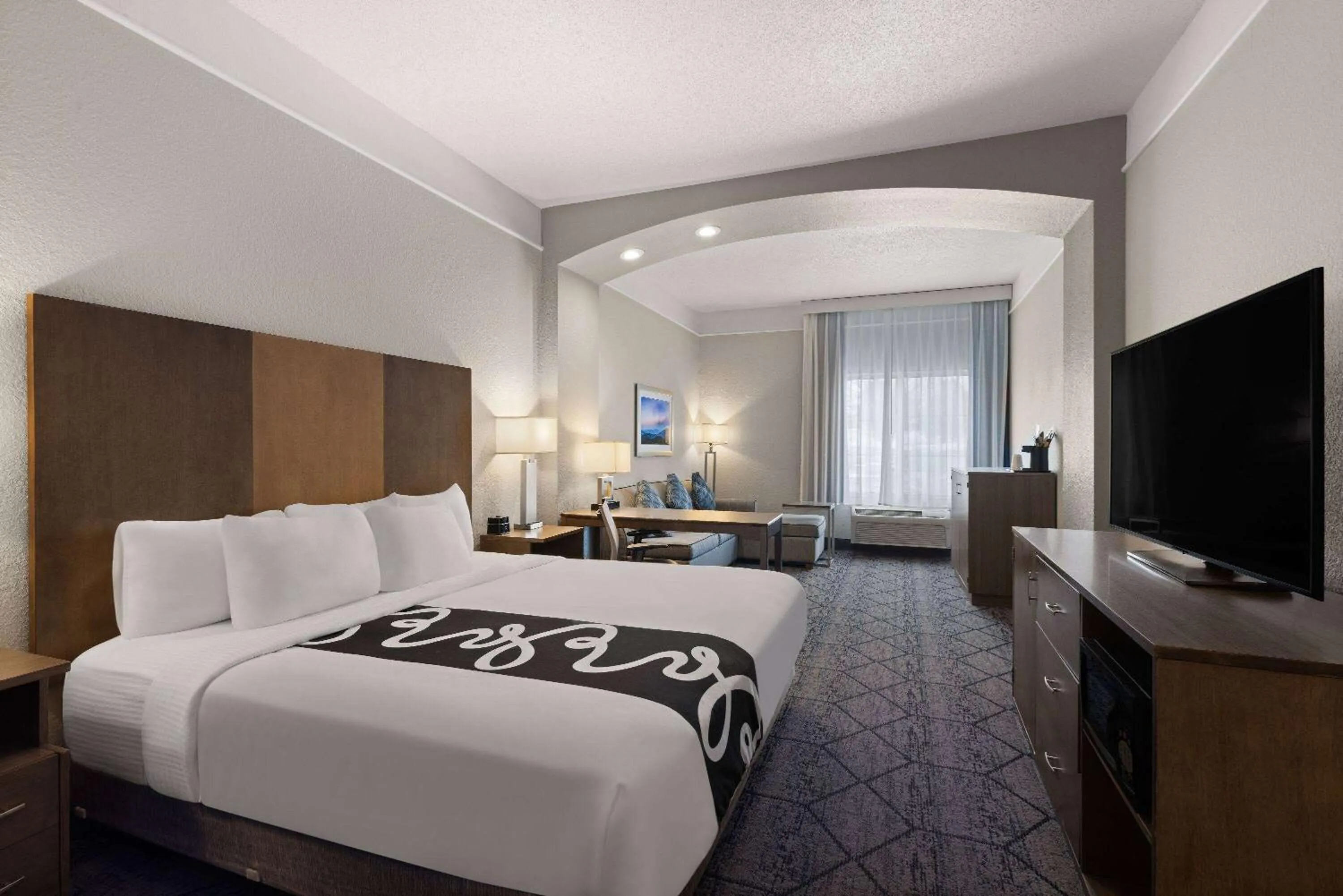 Photo of the whole room, Bed in La Quinta Inn and Suites by Wyndham at WaTiki Waterpark