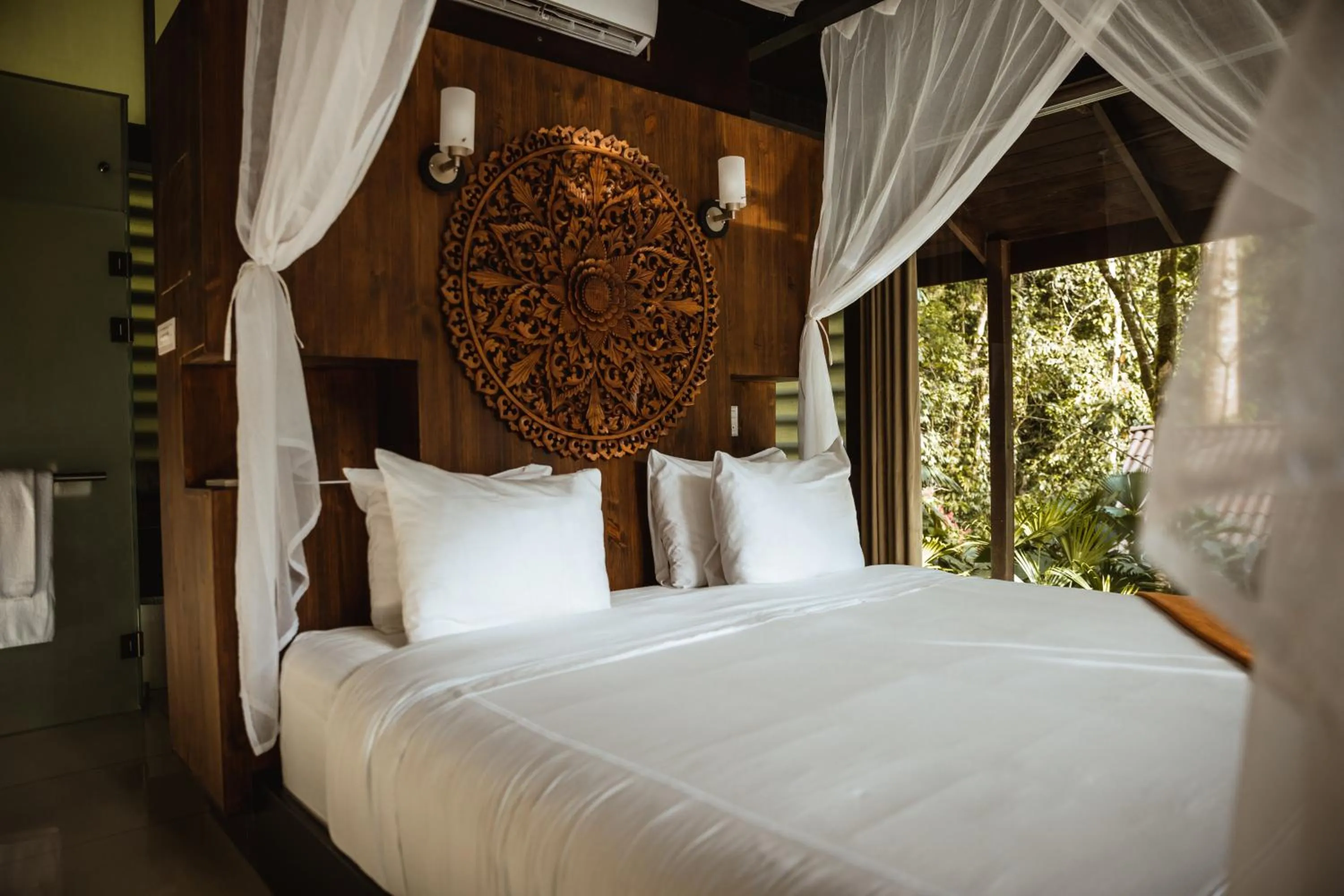 Bed in Oxygen Jungle Villas & Spa