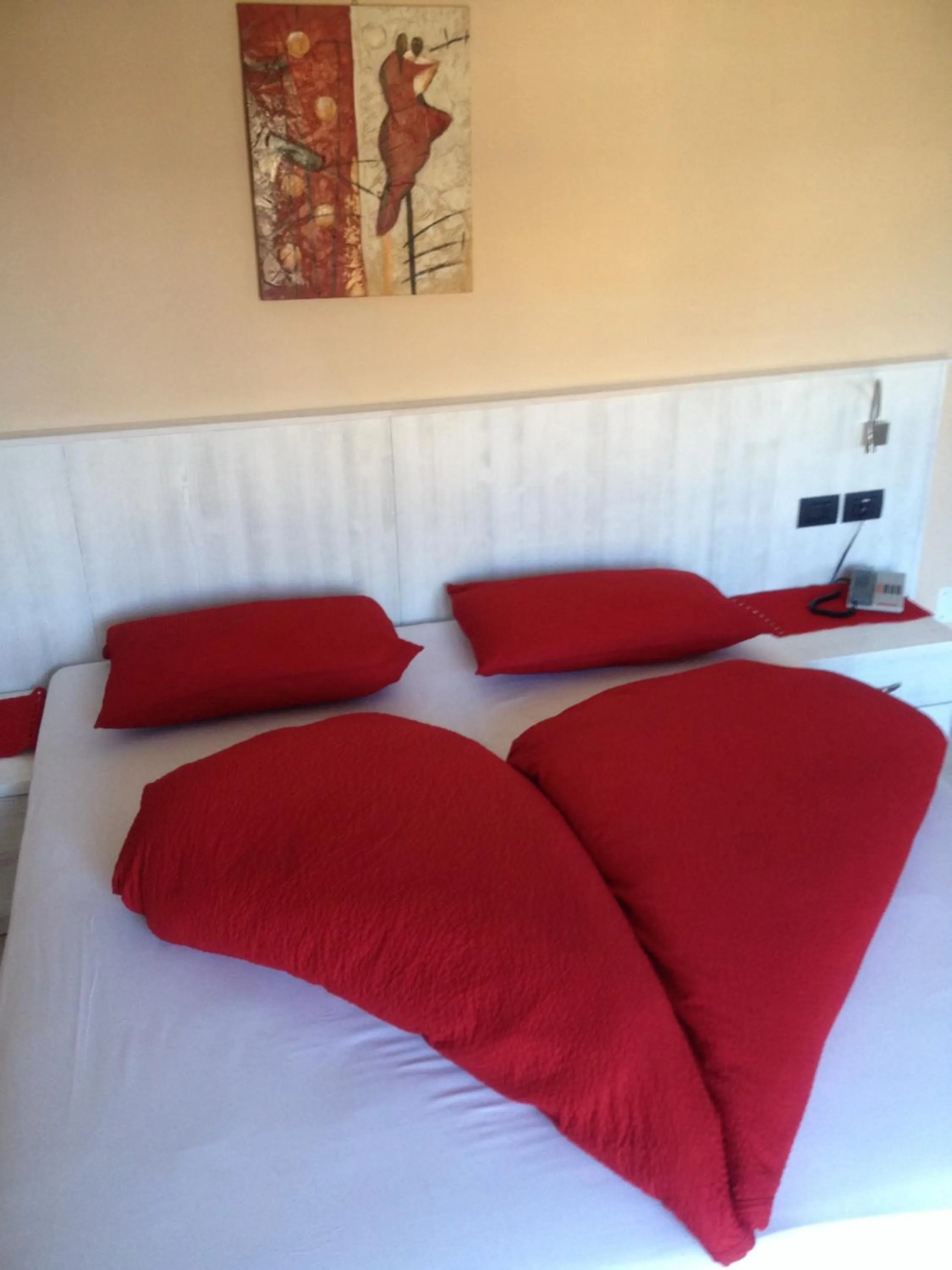 Bed in Hotel du Lac Parc & Residence