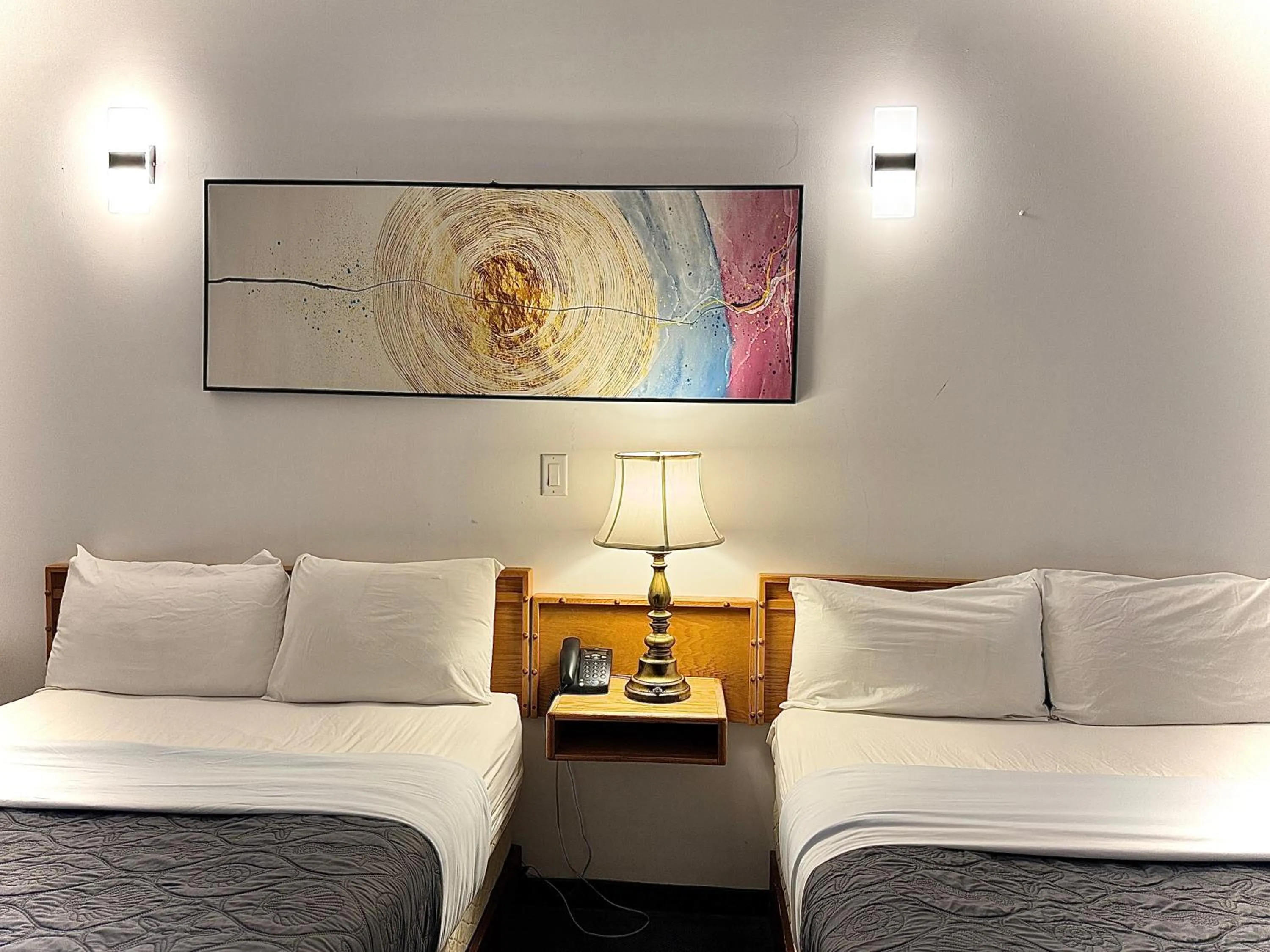 Bed in Sunshine Lodge Inn