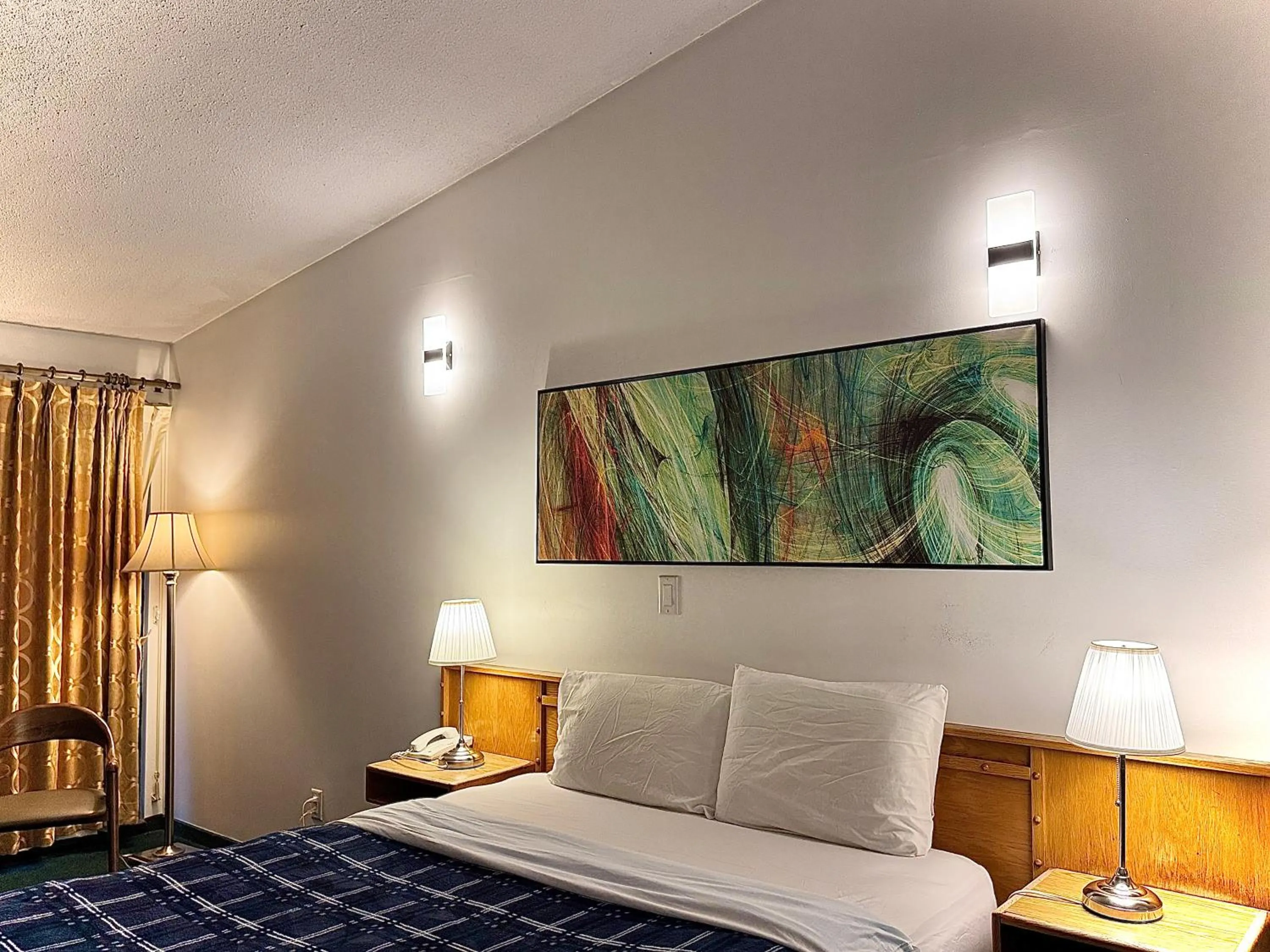 Bed in Sunshine Lodge Inn