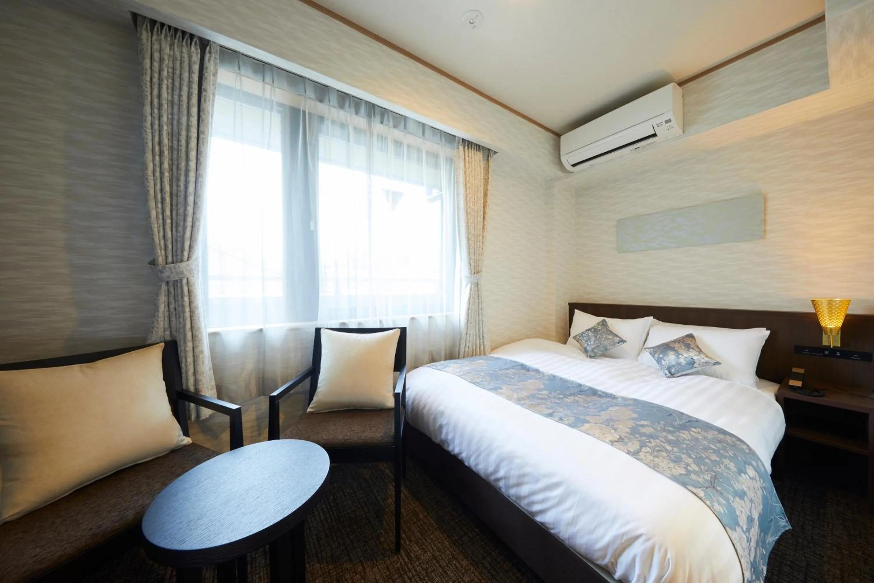 Photo of the whole room, Bed in Rinn Miyagawacho Grande