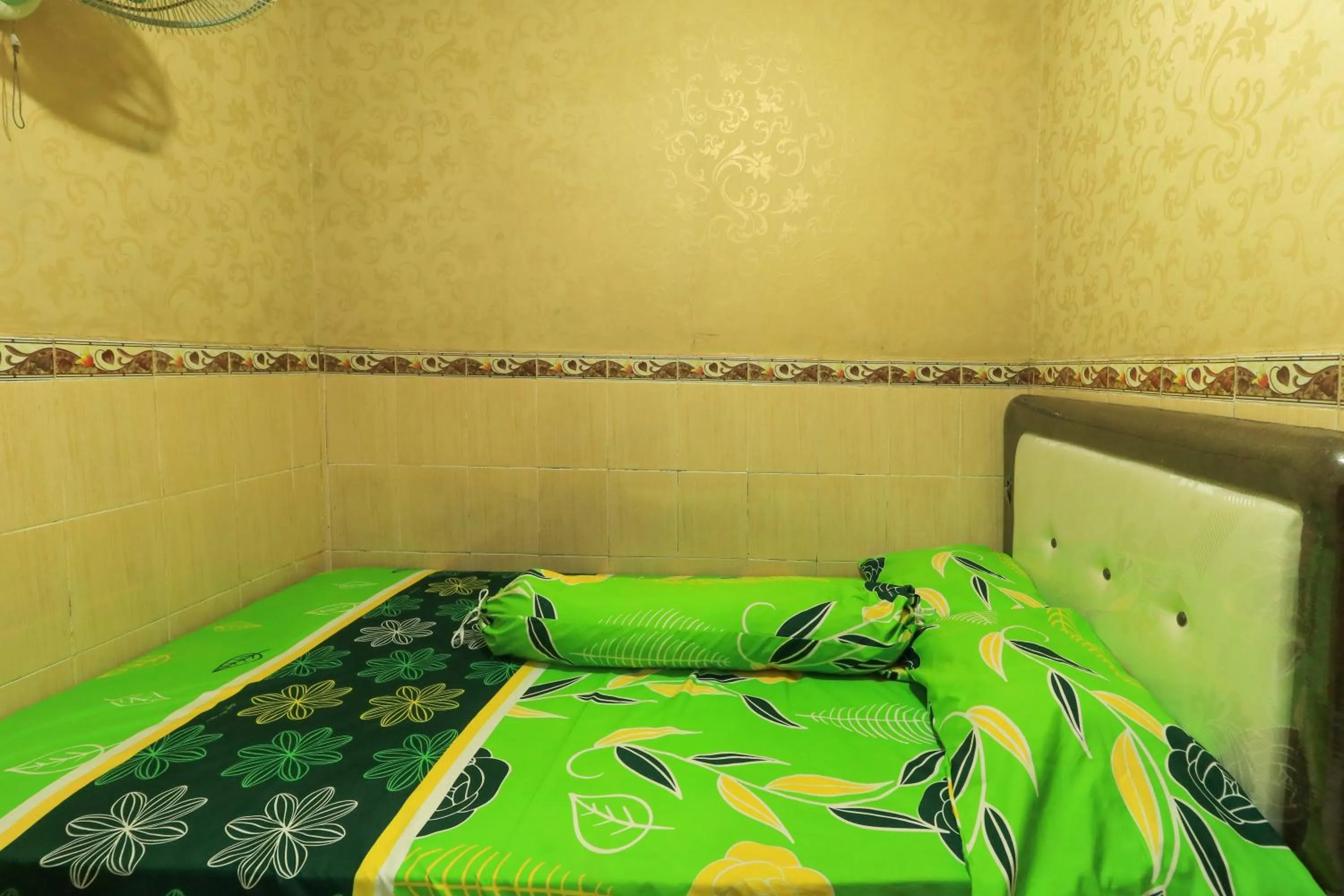 Bedroom, Bed in Dharmawati Homestay Syariah at Terminal Purabaya