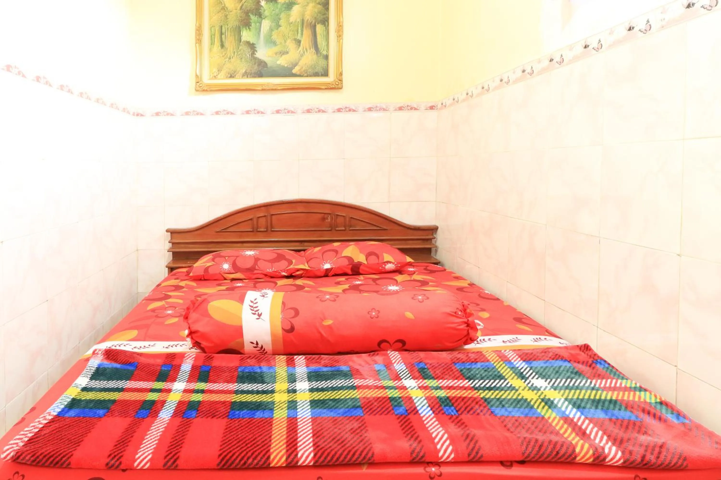 Bedroom, Bed in Dharmawati Homestay Syariah at Terminal Purabaya