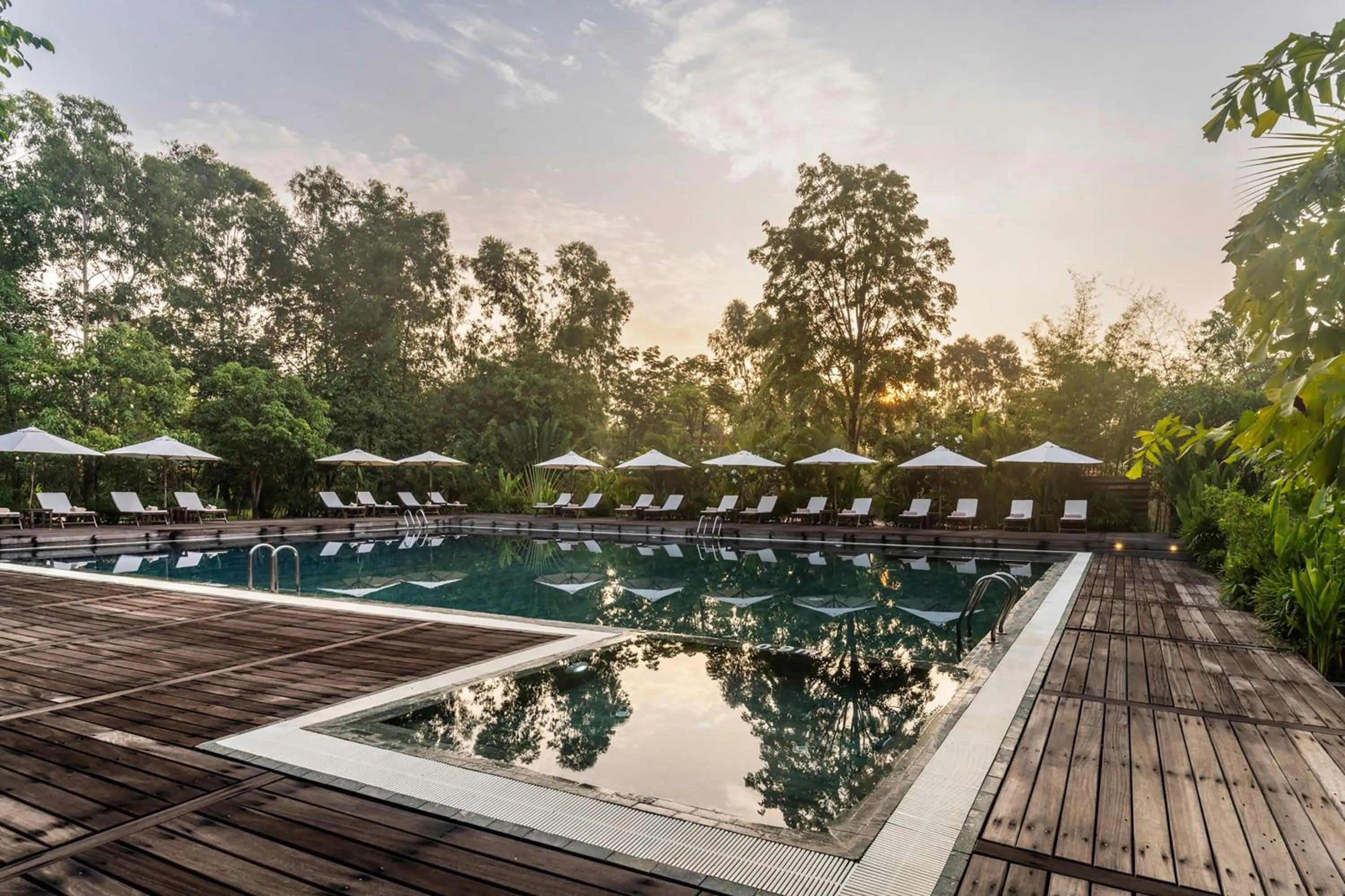 Swimming pool in Farmhouse Resort & Spa