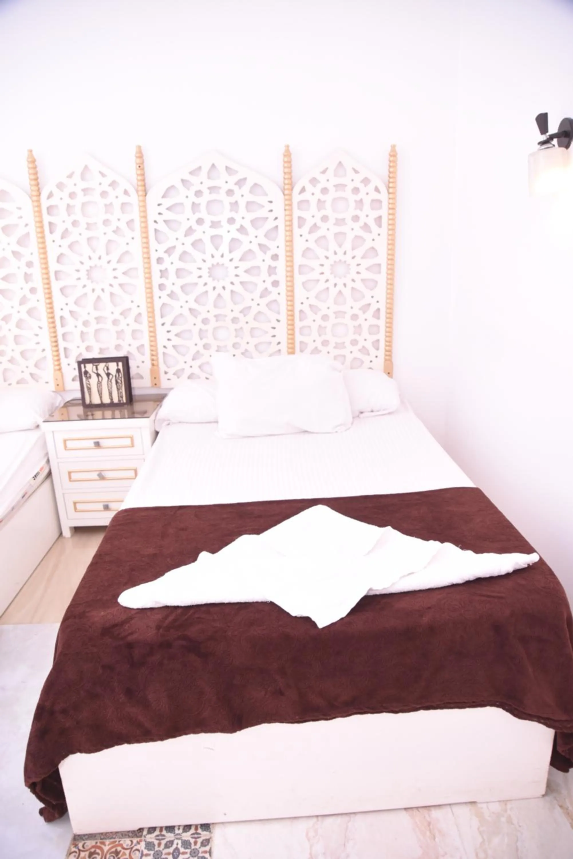 Bed in Arabian Nights Pyramids Guesthouse