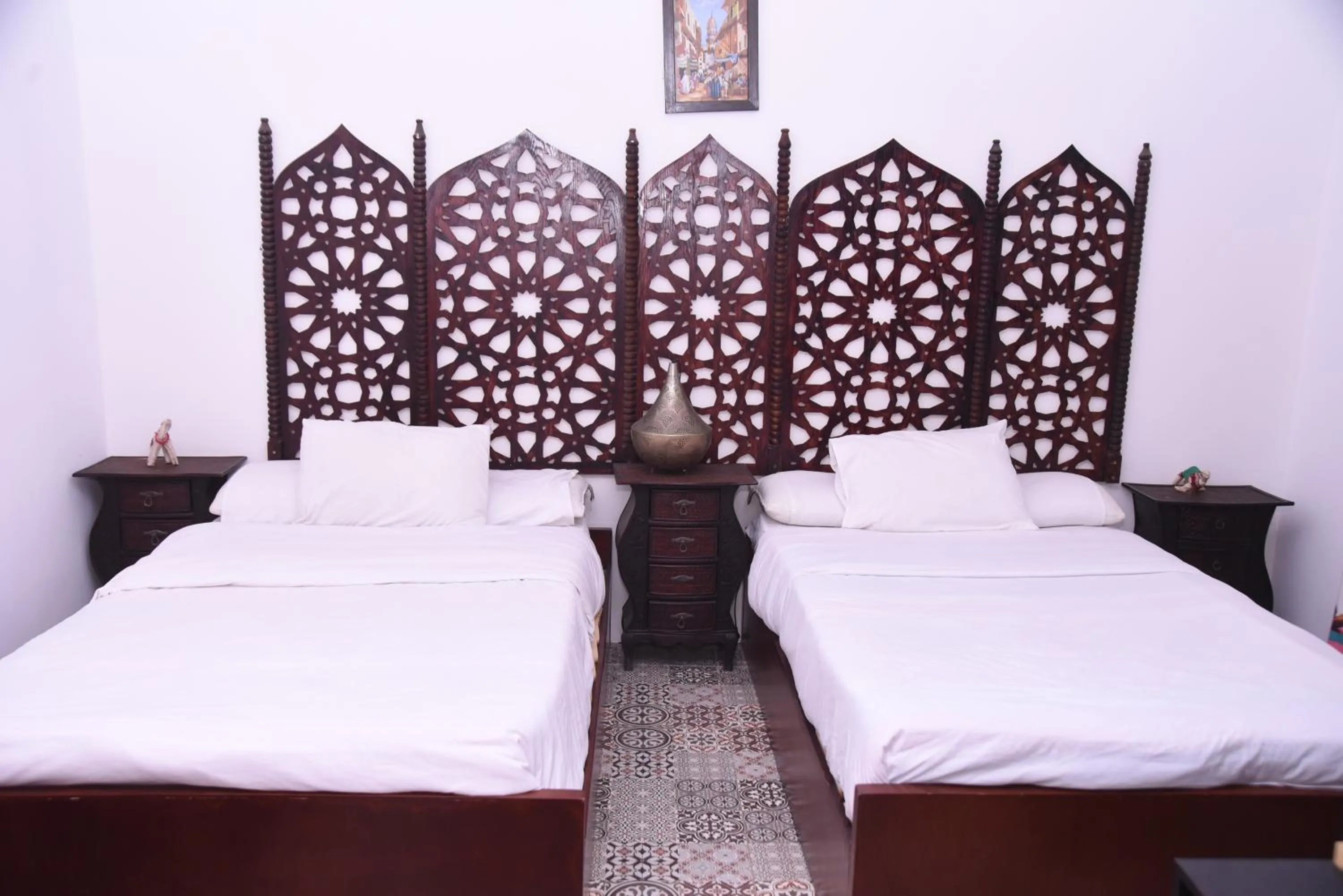 Bed in Arabian Nights Pyramids Guesthouse