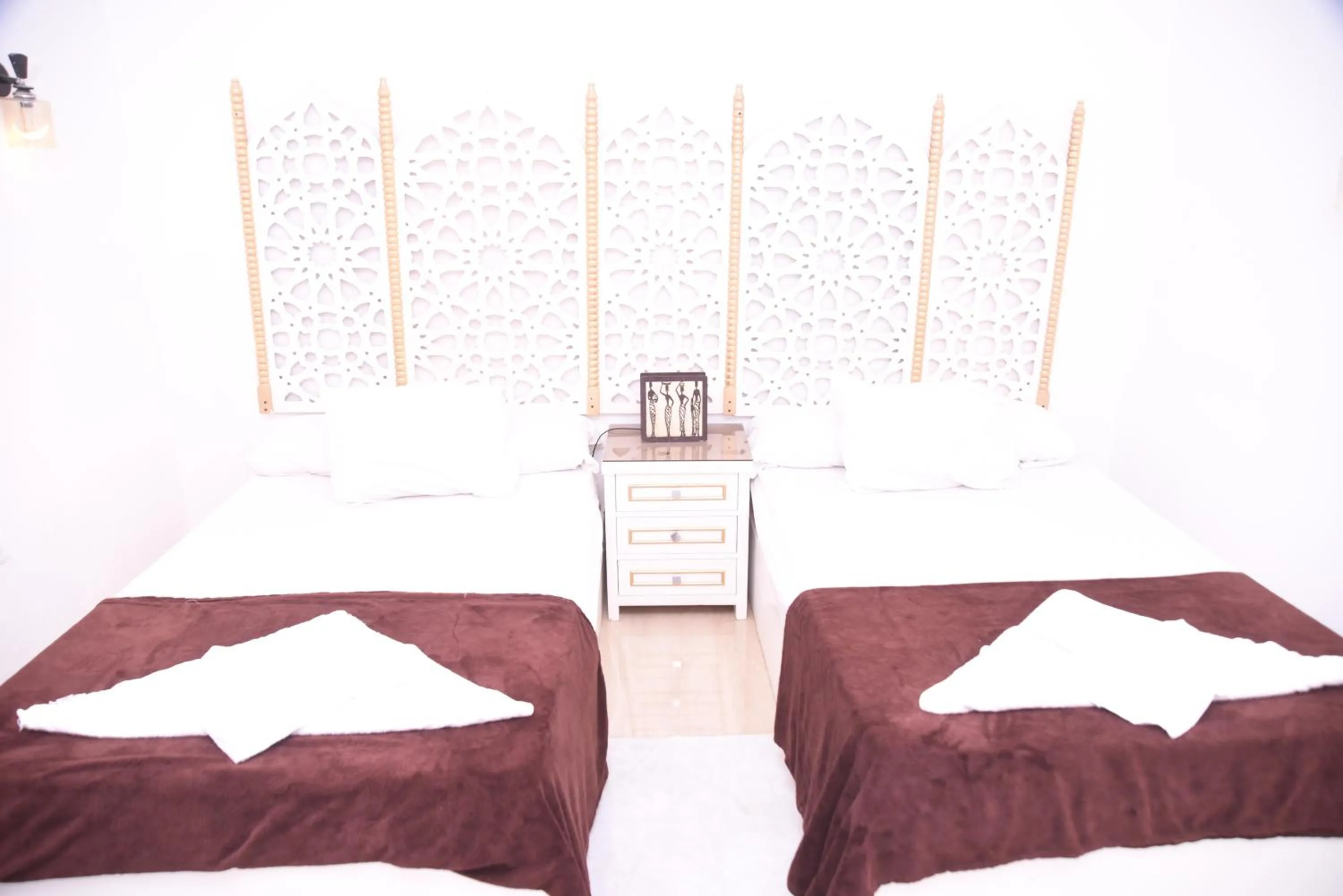 Bed in Arabian Nights Pyramids Guesthouse