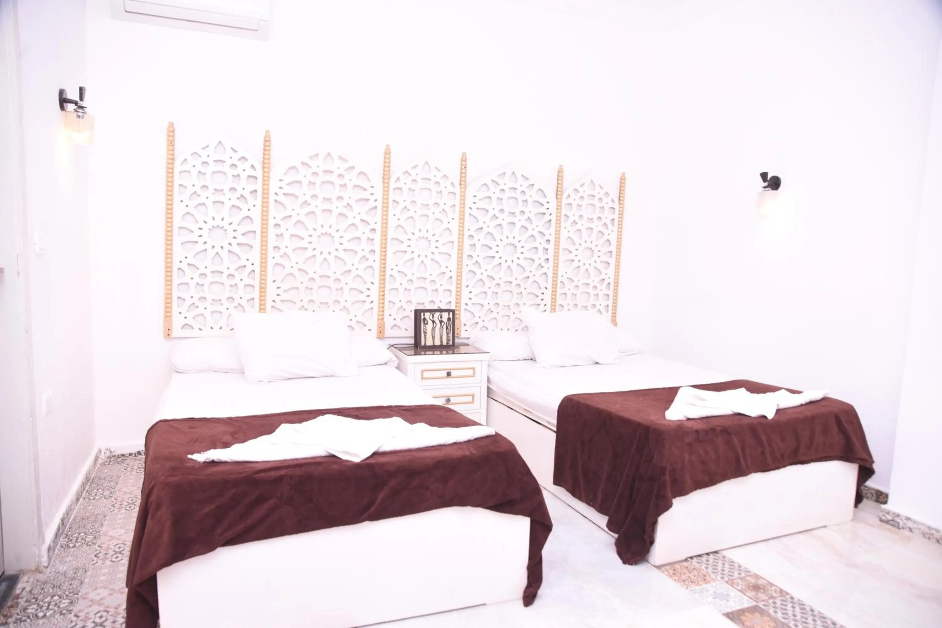 Bed in Arabian Nights Pyramids Guesthouse