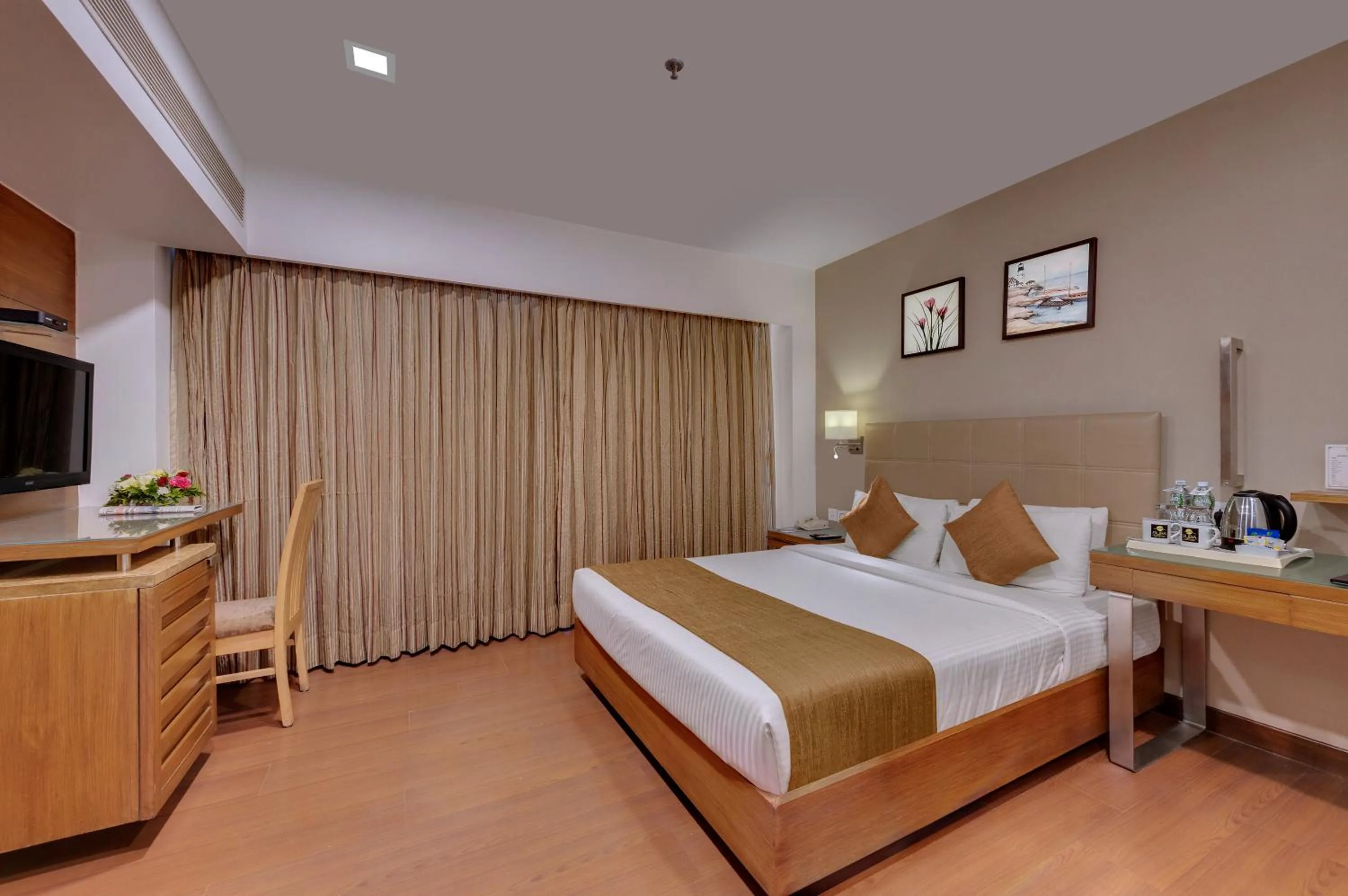 TV and multimedia, Bed in Hotel Suba Star Ahmedabad